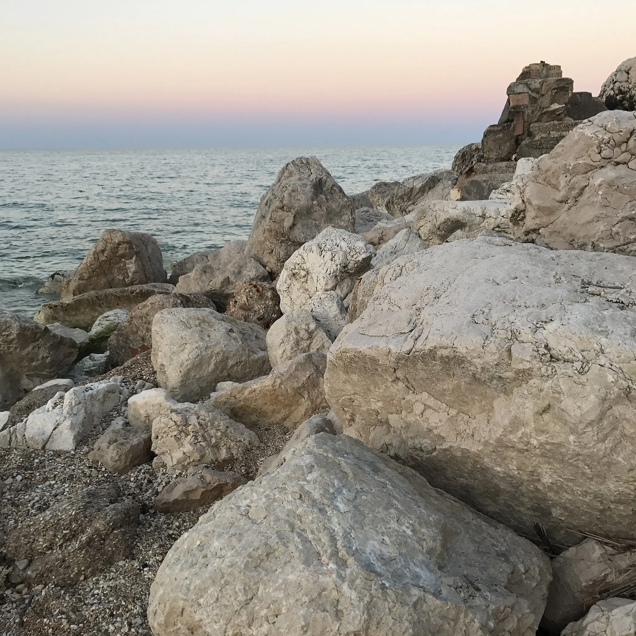 Photo showing: Stones on the beach at sunset