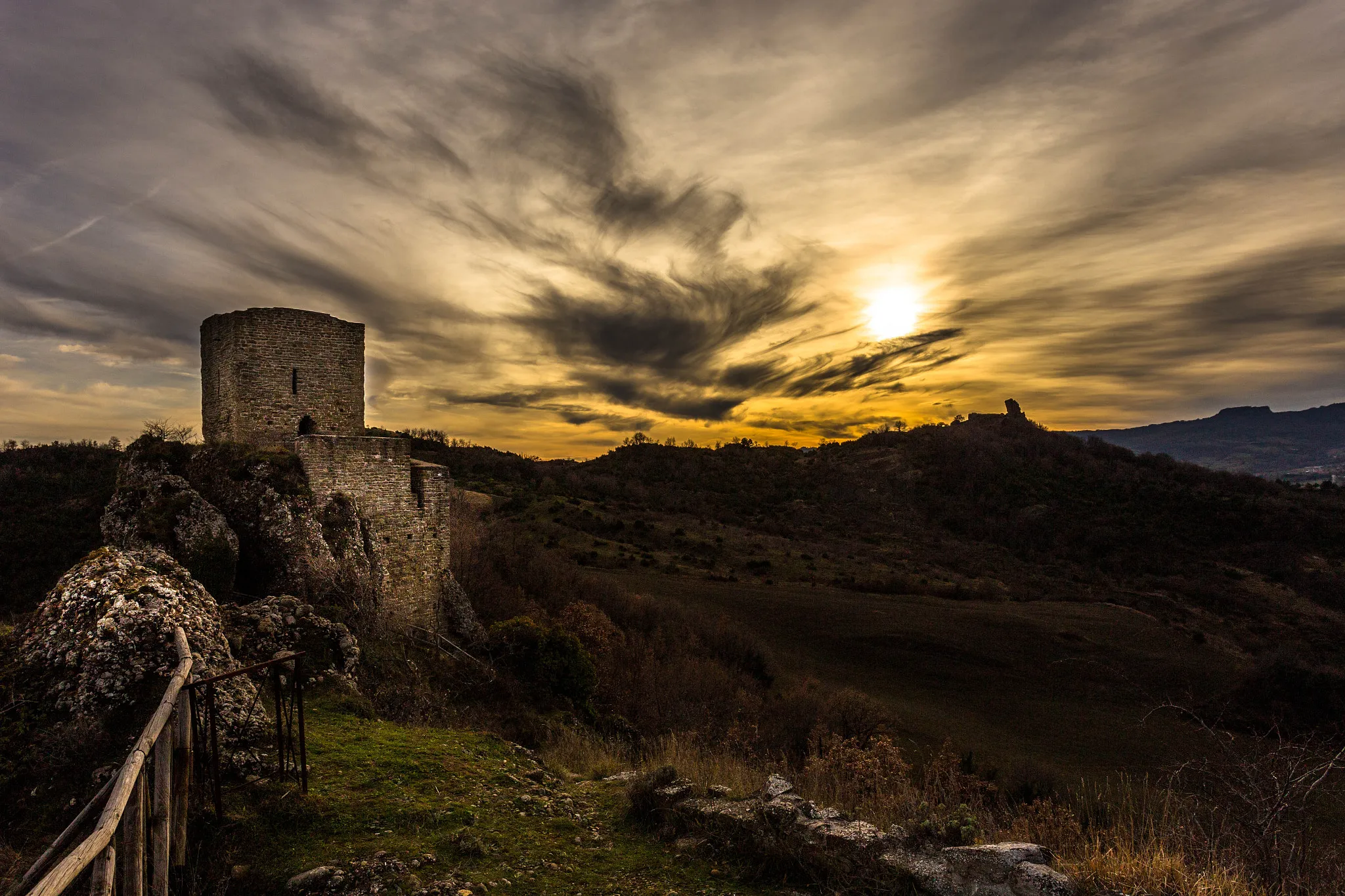 Photo showing: 500px provided description: that's a really lonely place. Nobody around for many miles. [#sky ,#landscape ,#sunset ,#clouds ,#italy ,#architecture ,#castle ,#abandoned ,#cielo ,#dusk ,#lowkey ,#gloom ,#castello ,#tramonto ,#nuvole ,#castello diroccato]