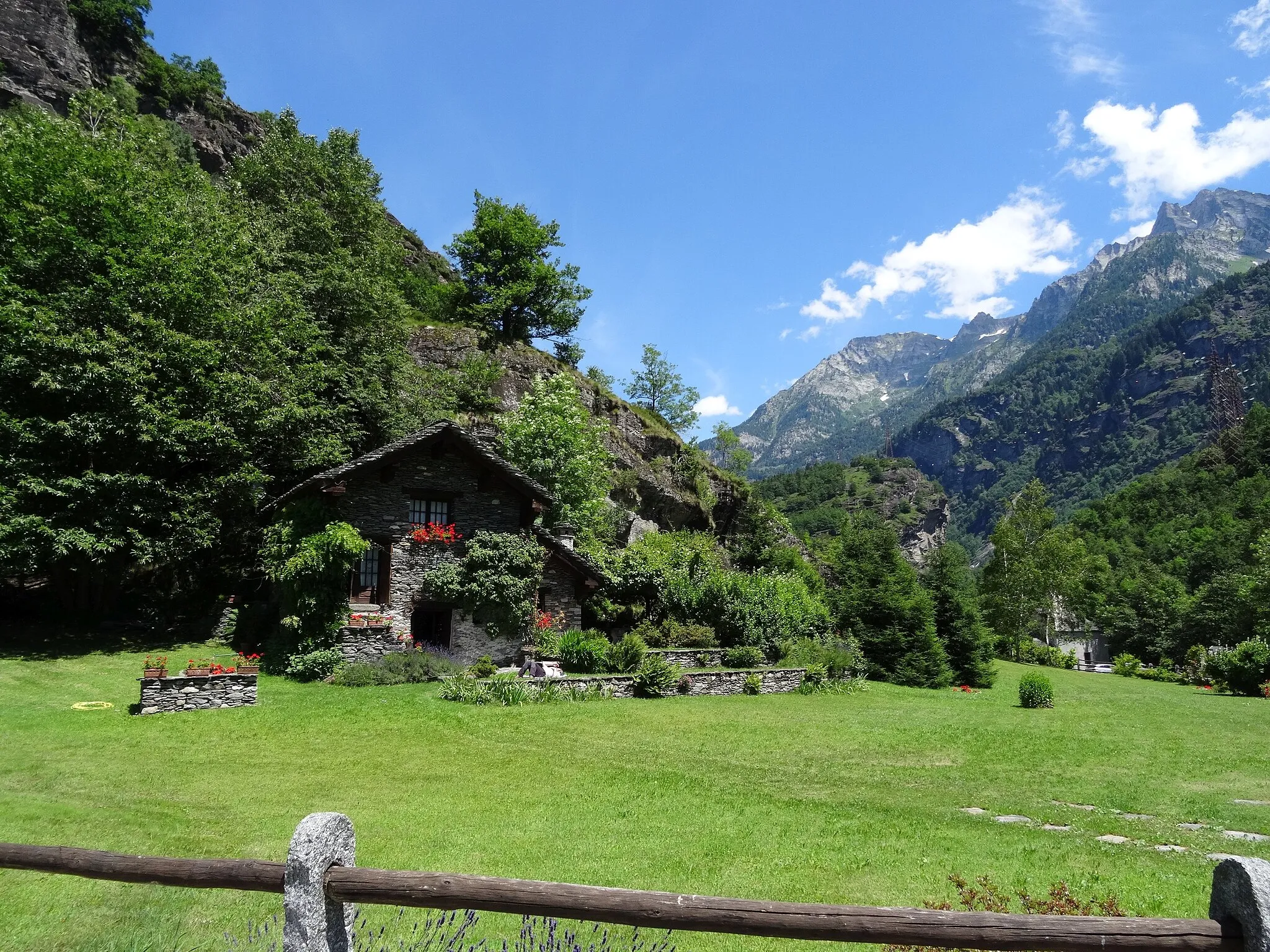 Photo showing: to the left behind is the entrance to the northeast ravine, to the right is the little church of Santa Lucia