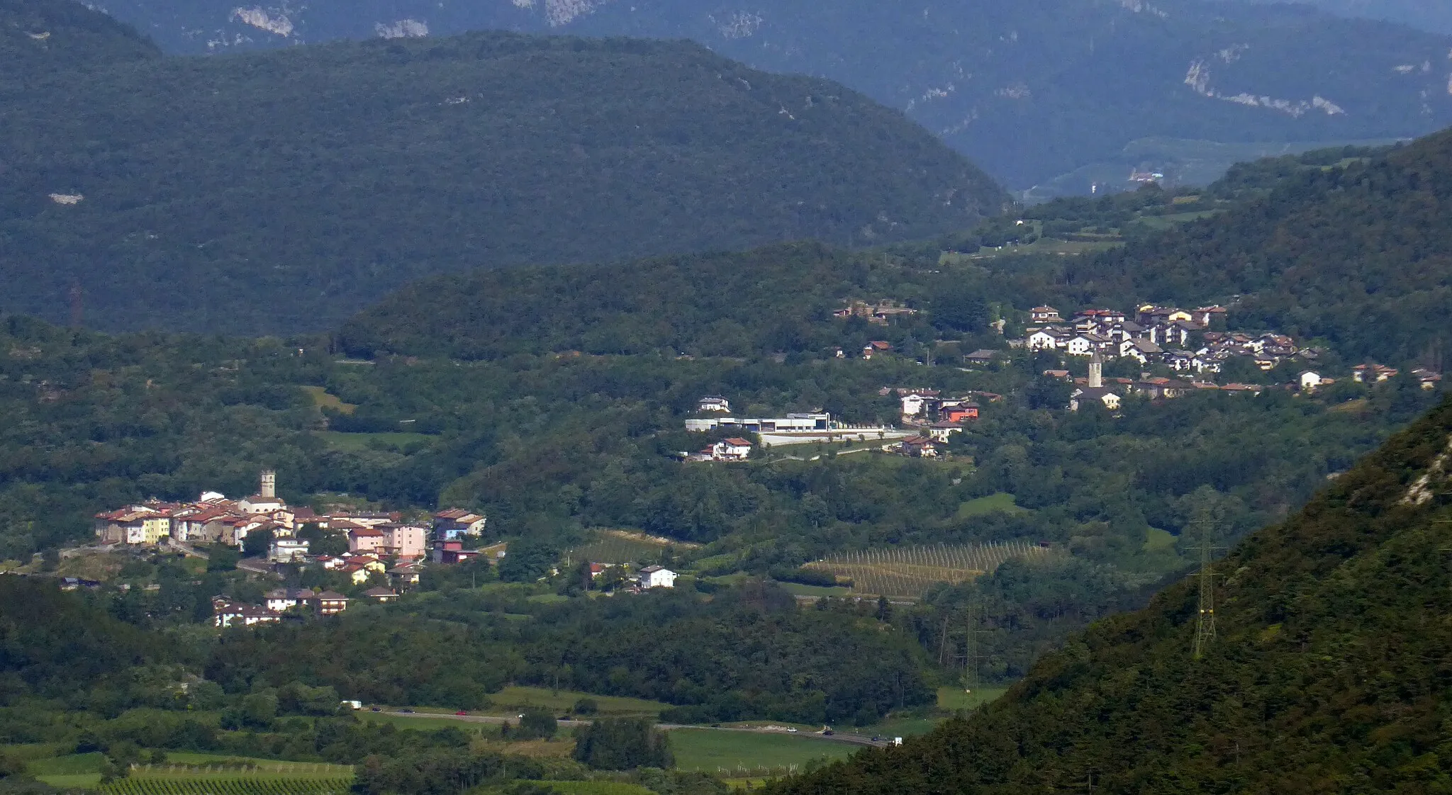 Photo showing: The towns of Vigolo Baselga and Baselga del Bondone as seen from SP18 dir Ranzo