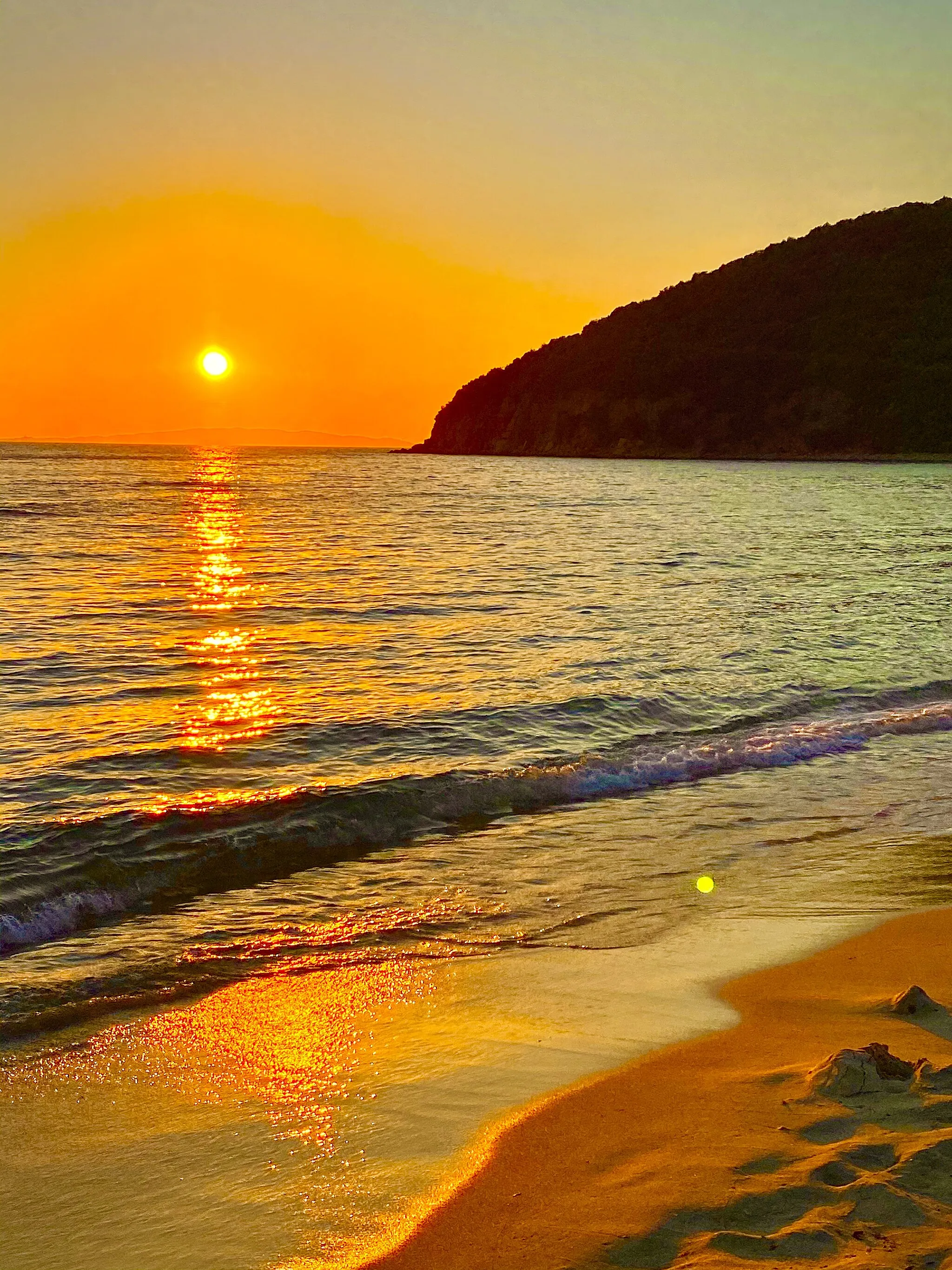 Photo showing: Cala Violina al tramonto.