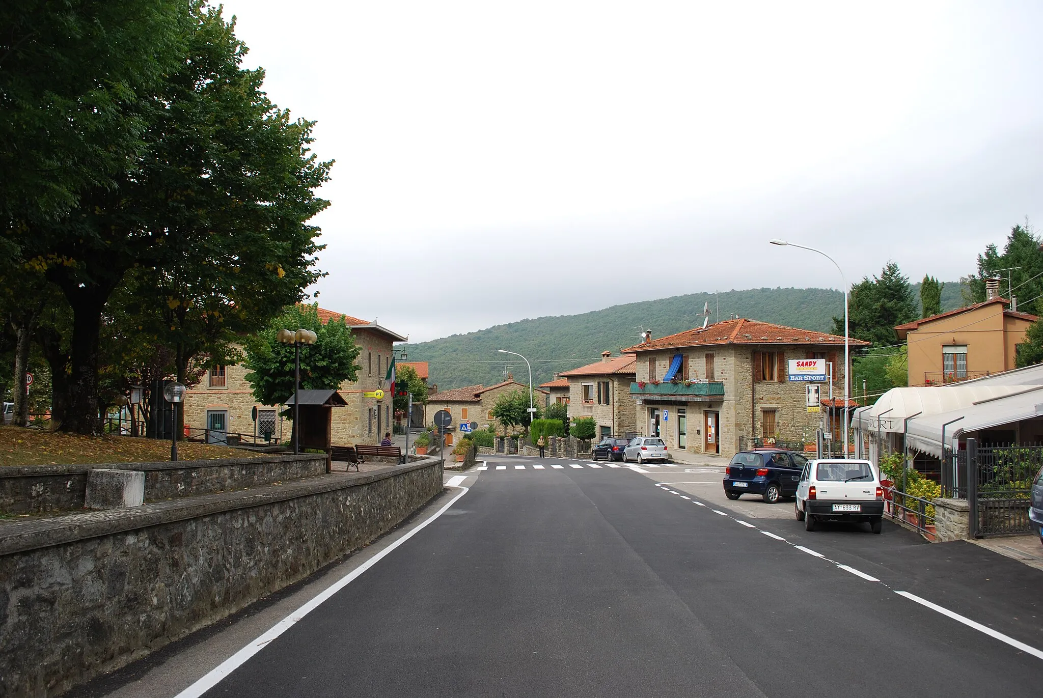 Photo showing: Village Chitignano, province Arezzo. The central square. Town hall and park to the left.
