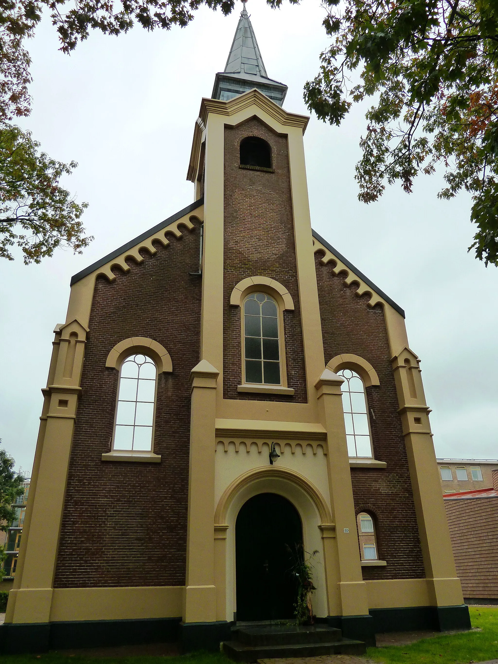 Photo showing: Vooraanzicht van de vroegere Eexterkerk, die in 2010 op de toren na gesloopt werd.