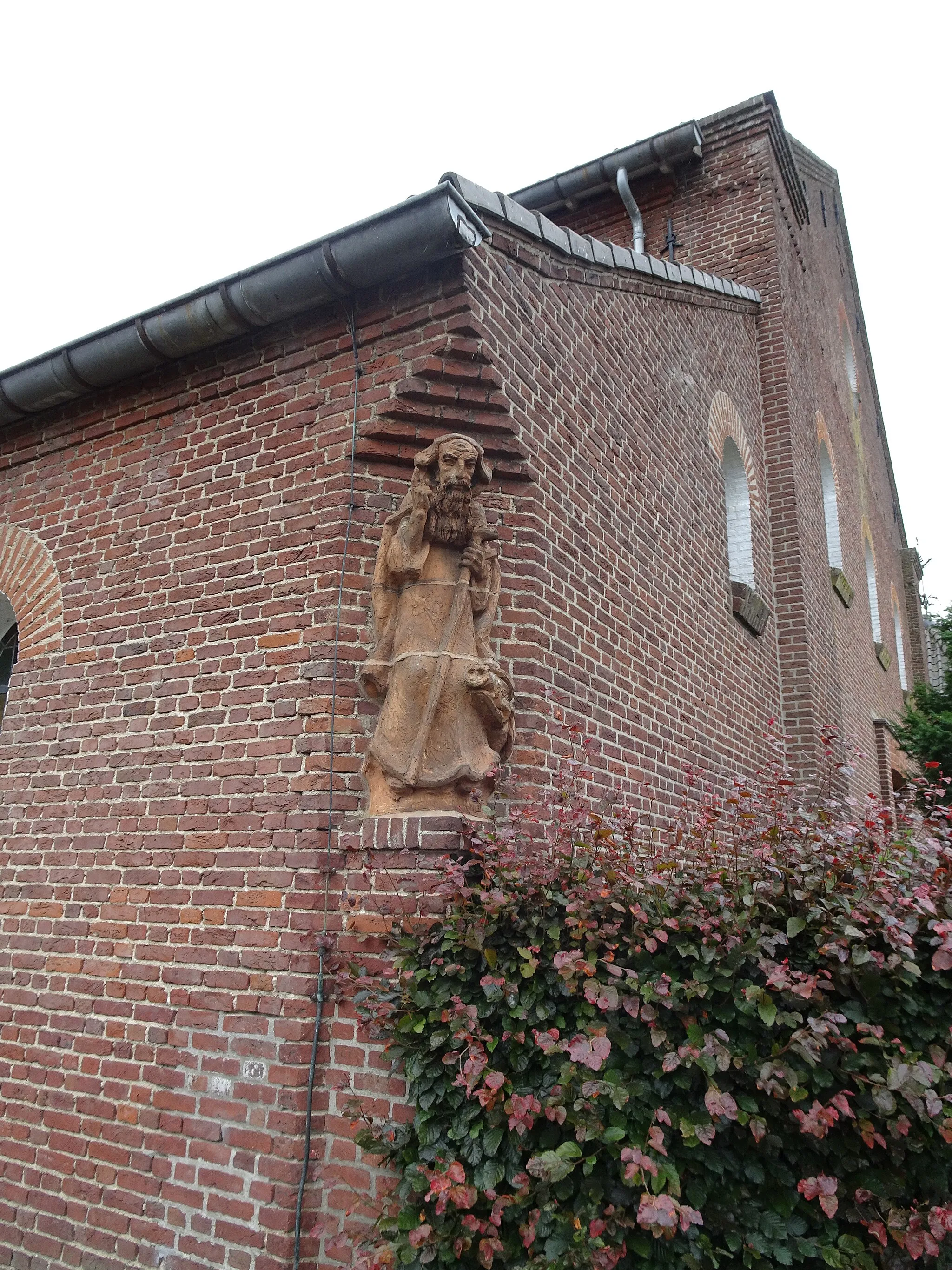 Photo showing: Sint Antonius met het varken aan de muur van de rooms katholieke kerk AAntonius van Padua in Breedeweg