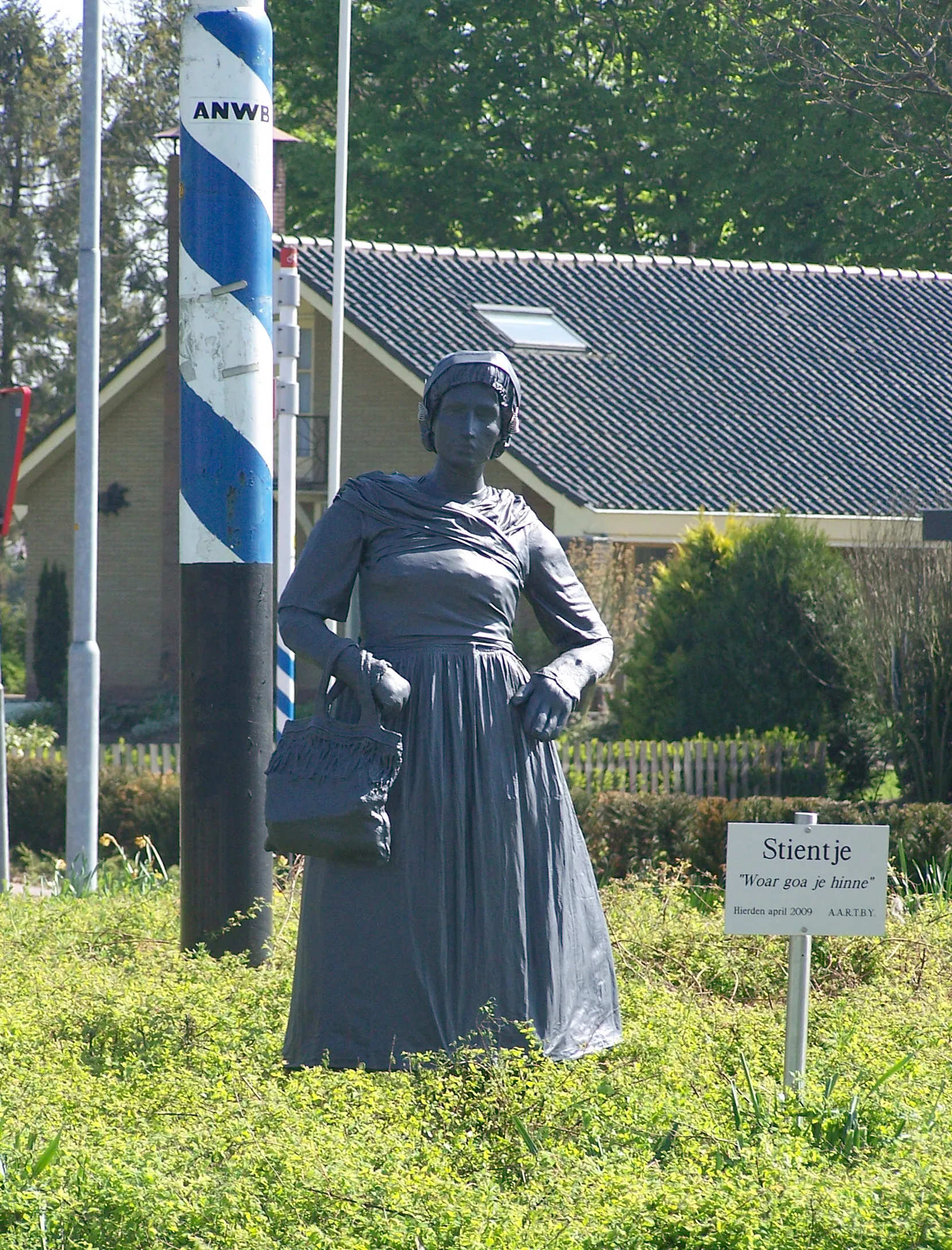 Photo showing: Sculpture of an "avarage" woman named Stientje. Made by artgroup A.A.R.T.B.Y. in 2009. Placed at the roundabound at the Zuiderzeeweg in Hierden as a form of protest since most roundabounds in the community Harderwijk have sculptures and Hierden seemed to be ignored.