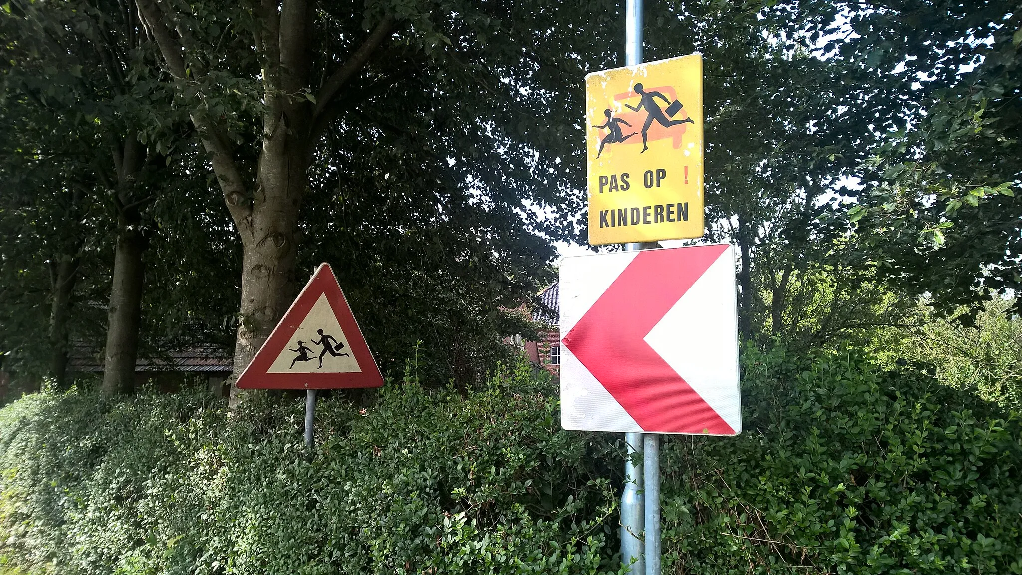 Photo showing: Various traffic signs telling drivers to slow down in Tripscompagnie, Menterwolde, Groningen province.