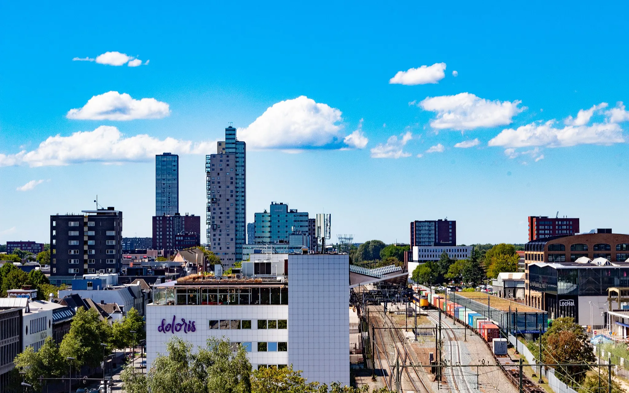 Photo showing: The Skyline of Tilburg with the station and the local and the spoorzone