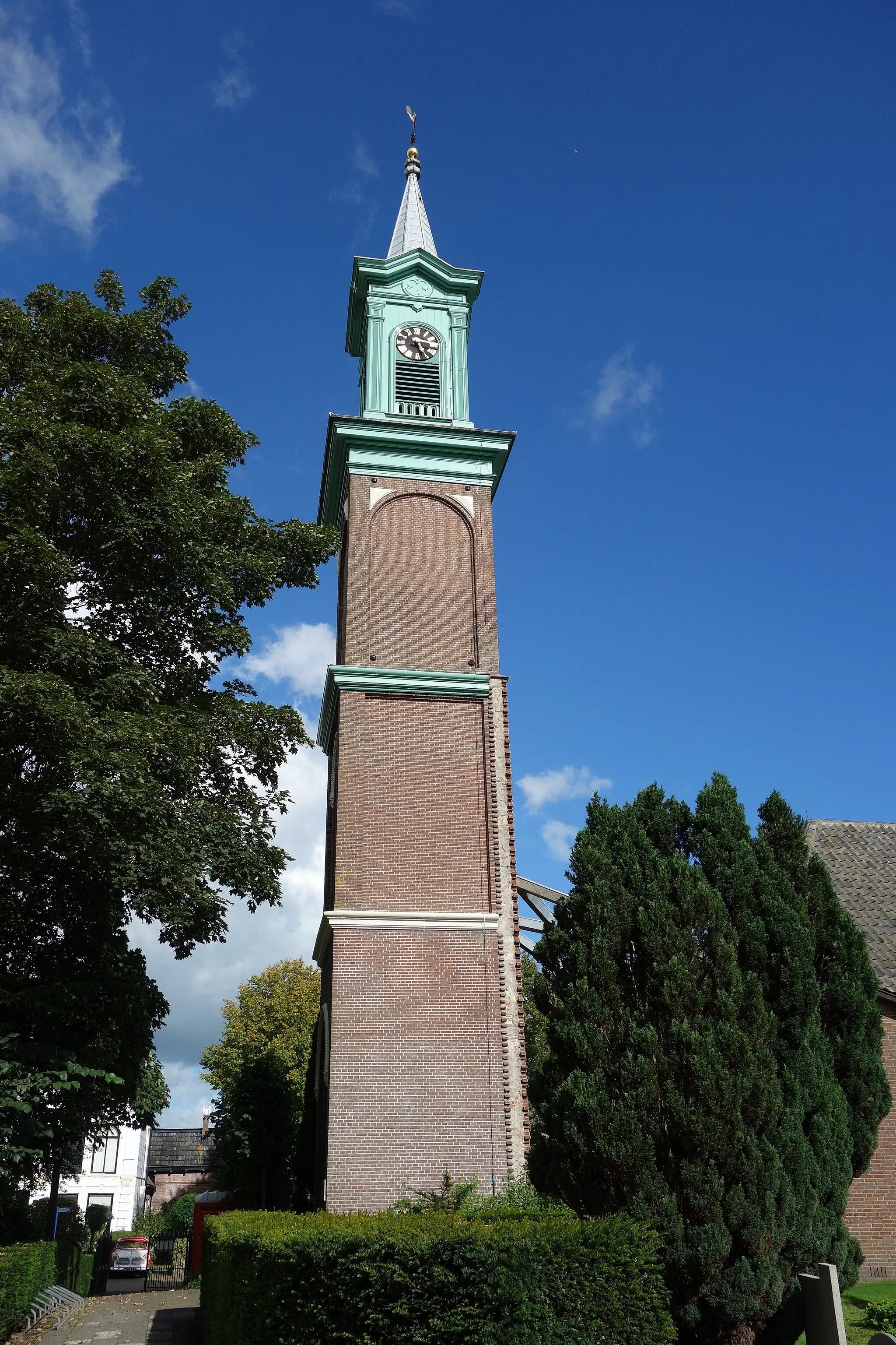 Photo showing: Toren van de voormalige Hervormde Kerk in Midwoud. Kerk is in 1984 afgebrand en los van de kerk is er een nieuw kerkgebouw gebouwd. De oude toren kon behouden blijven.