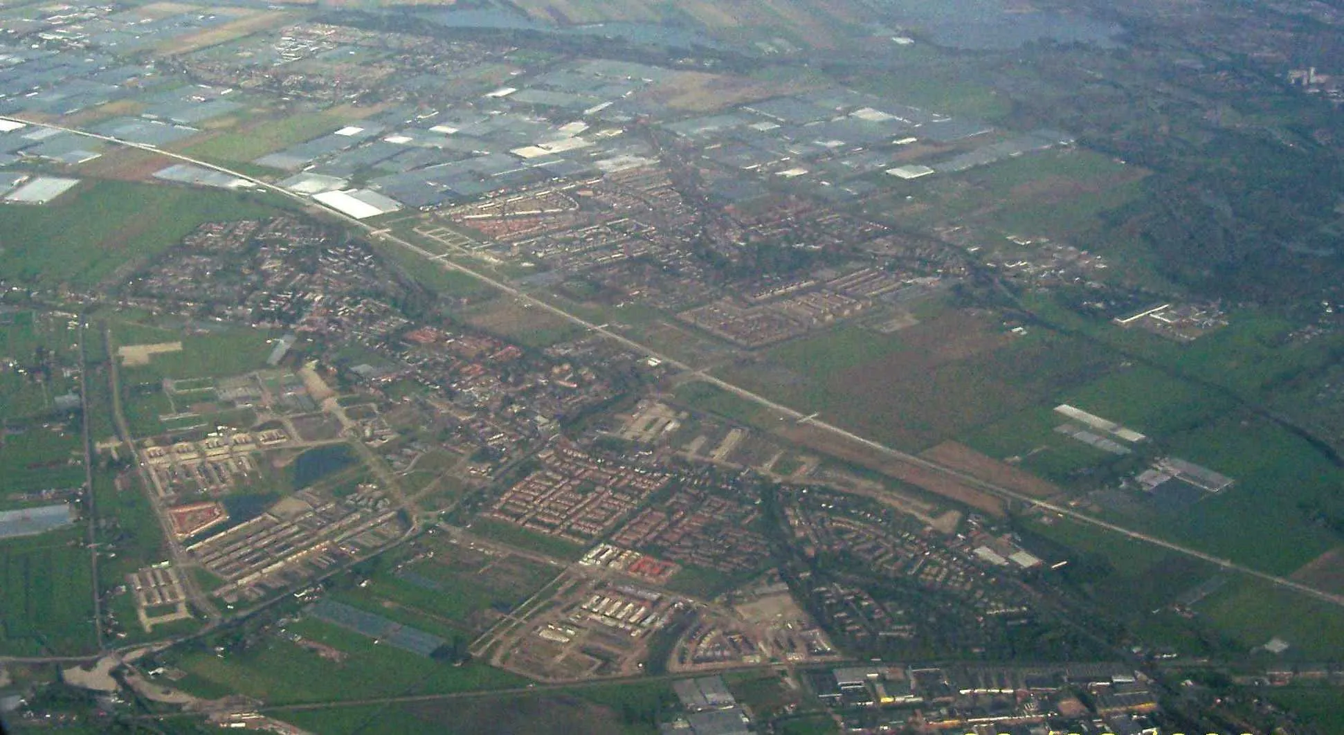 Photo showing: Aerial view of Berkel-en-Roderijs and Bergschenhoek, Bleiswijk visible in the distance, the Netherlands.