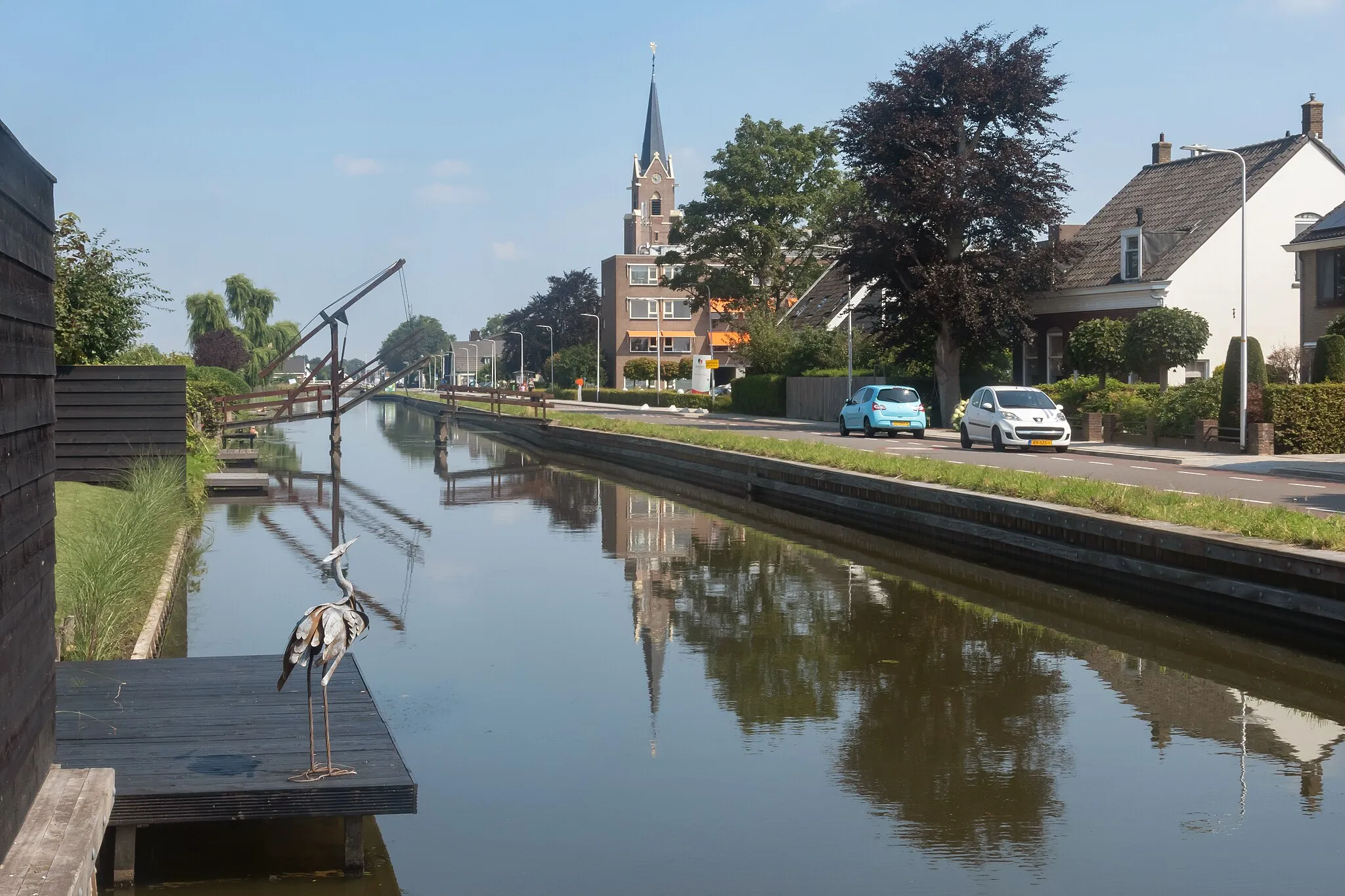 Photo showing: Berkel en Rodenrijs, canal laong the Noordeindeseweg with church (Sint Petruskerk) in the background