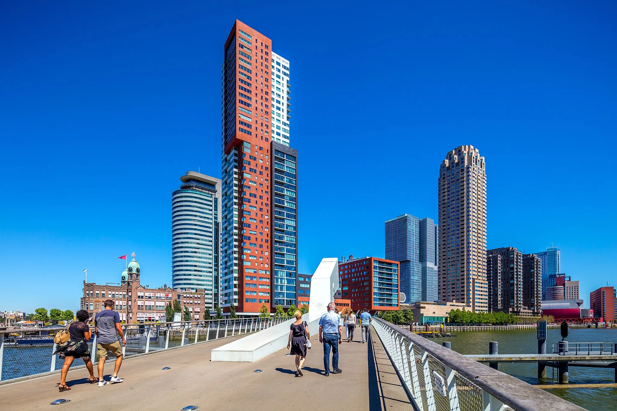 Photo showing: Skyline at Kop Van Zuid (Wilhelminapier), Rotterdam (07/2018) - Human picture: (1 body / 1 lens / 1 human = 1 picture ) 0% AI... ;- ) ...
Following vandalization (Rotterdam) of my work, final stop of this series on European cities.
My work not being respected, I definitively stop my publications in Wikimedia Commons (including definition and quality updates).
Final publication in Wikimedia Commons: https://commons.wikimedia.org/wiki/File:GraphyArchy_-_Wikipedia_00982.jpg
I also stop my GraphyArchyPocket series (before vandalization ...).

Final publication in Wikimedia Commons: https://commons.wikimedia.org/wiki/File:GraphyArchyPocket_._Wikipedia_00073.jpg