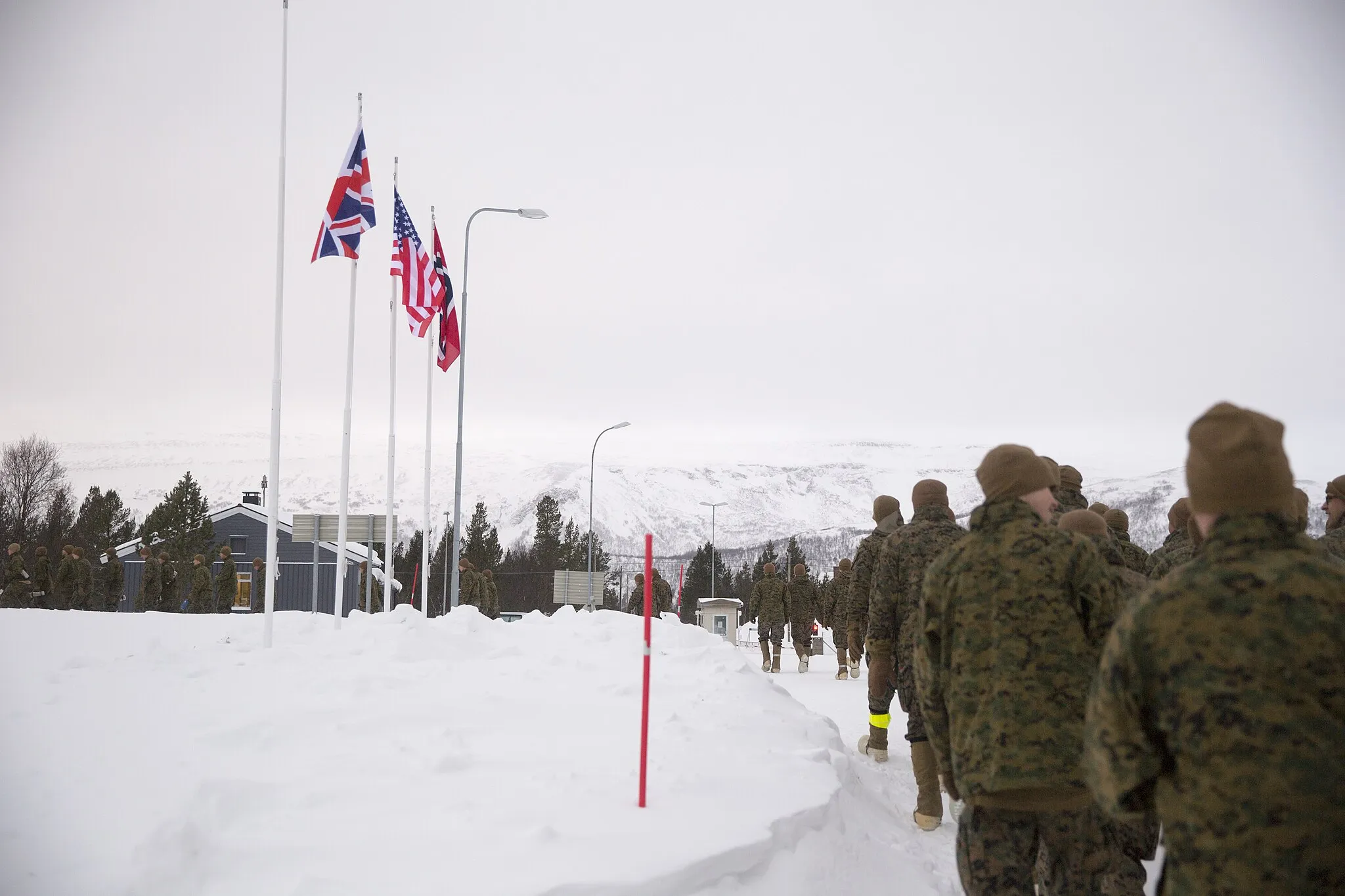 Photo showing: Marines with Black Sea Rotational Force receive an on-base tour during cold-weather training aboard Porsangmoen, Norway, Jan. 30, 2016. The Arctic training was hosted by the Norwegian military and conducted by U.K. Royal Commandos to improve the U.S. Marine Corps’ capability to respond and operate in different environments. (U.S. Marine Corps photo by Cpl. Immanuel Johnson/Released)
Unit: U.S. Marine Corps Forces Europe and Africa