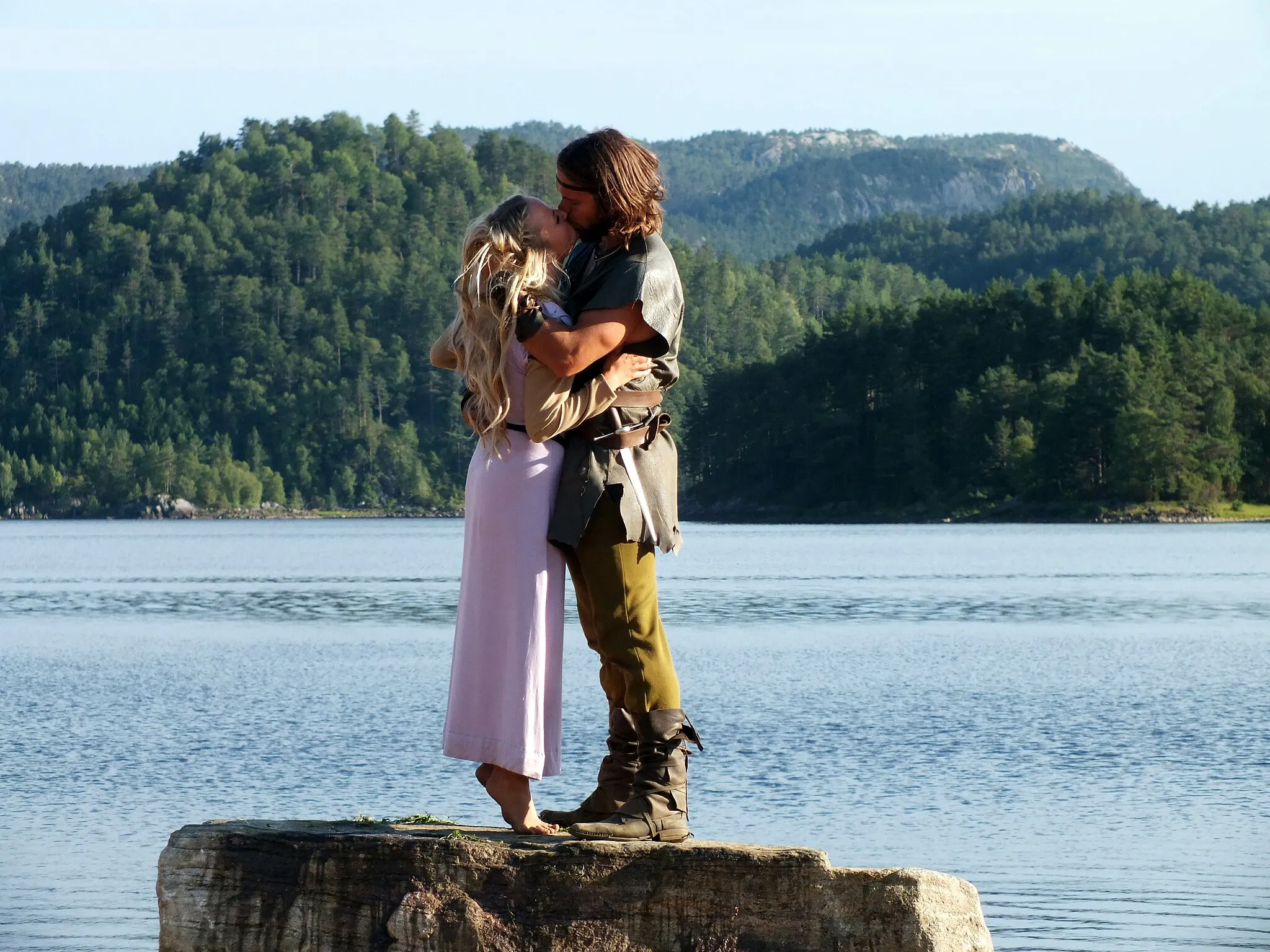 Photo showing: Vilborg (Tiril Heide Steen) and Aude (Brage Bang) in a lovescene in the Viking drama Beltespenna.