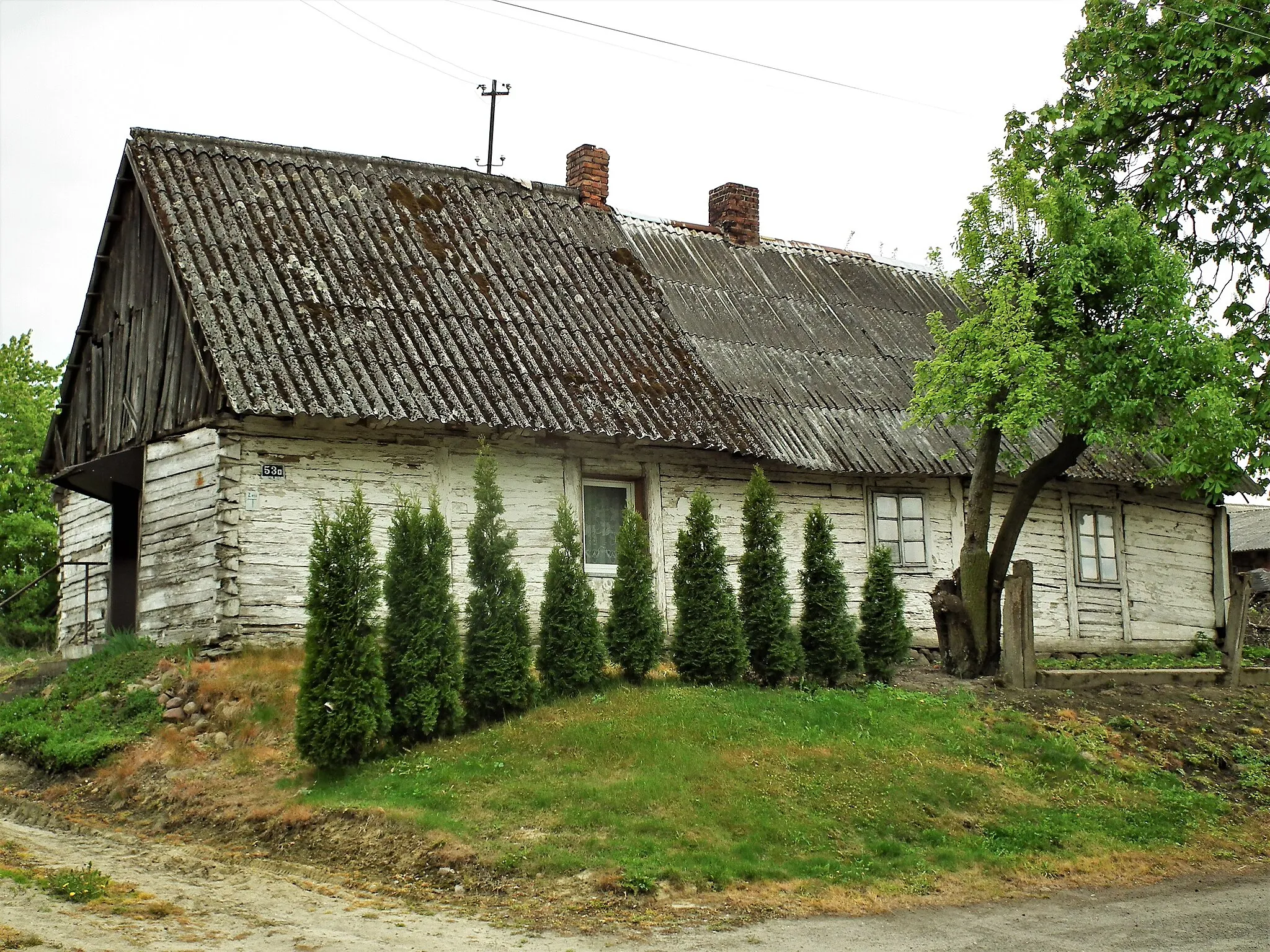 Photo showing: Drewniana chałupa w Popowicach koło Wielunia.