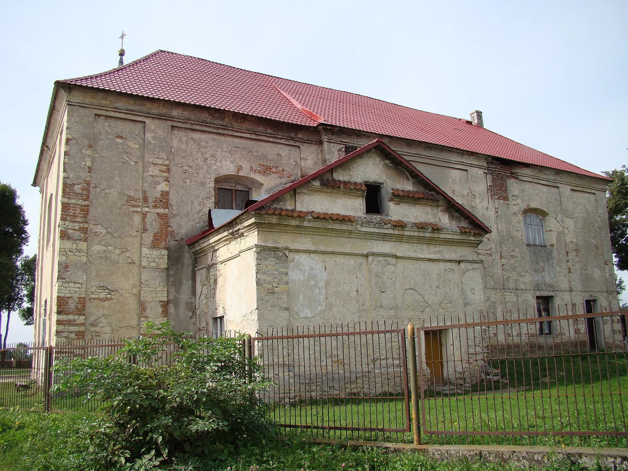 Photo showing: Kościół par., ob. organistówka i dom parafialny. Zespół kościóła par. p.w. św. Wita w Mełgwi
