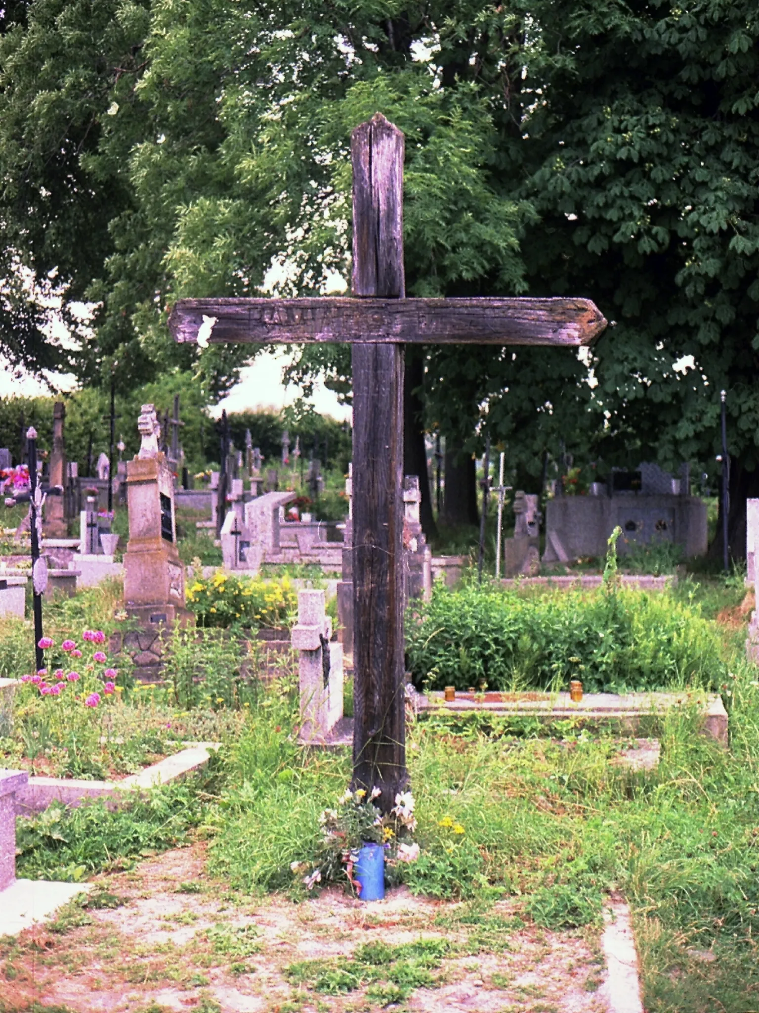 Photo showing: Łużna, parish cemetery - now non-existent cross missionary in 1929