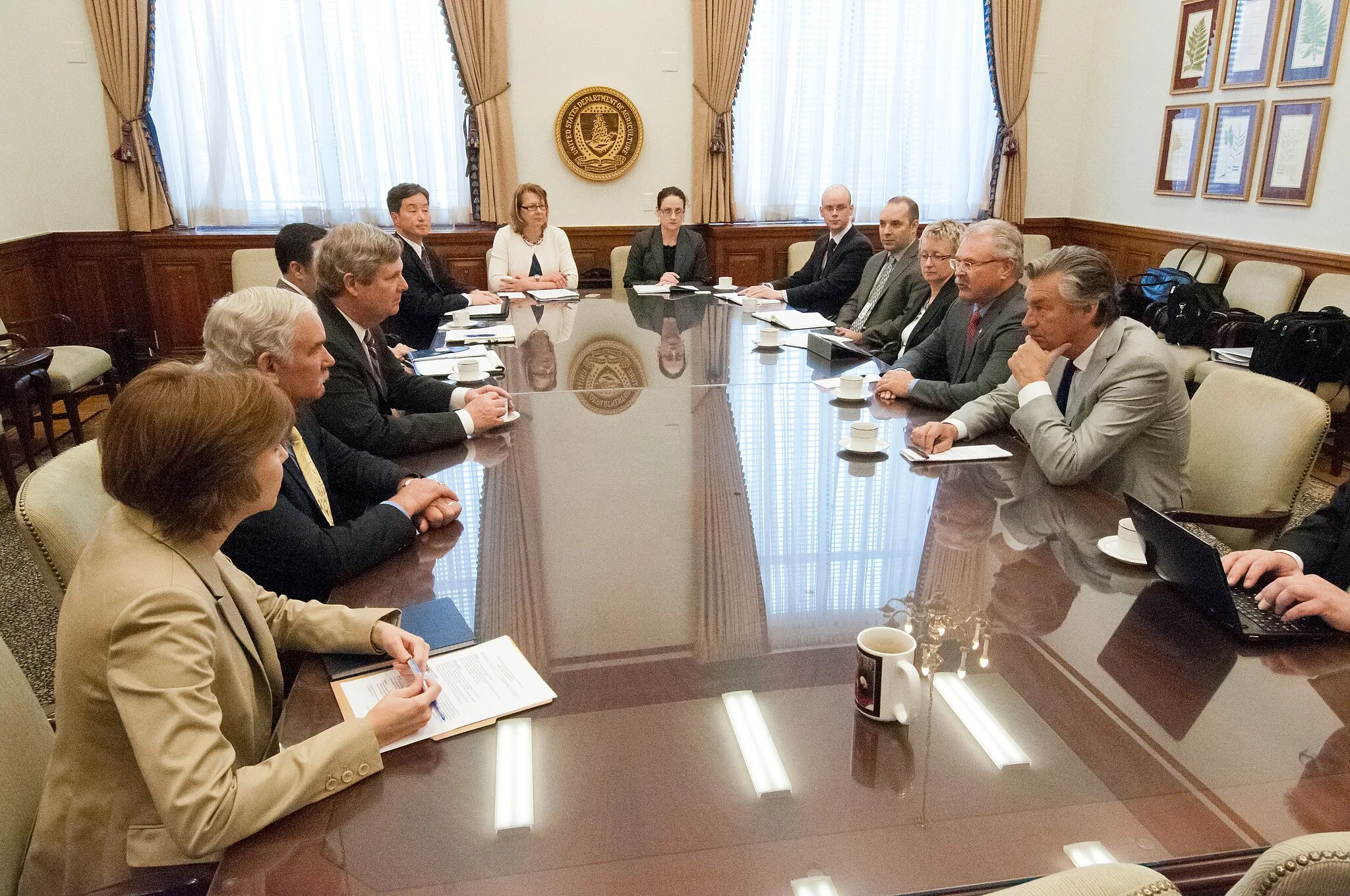 Photo showing: Agriculture Secretary Tom Vilsack met with Gerry Ritz, Canadian Minister of Agriculture and Canadian Ambassador Gary Doer to discuss cooperation, economics and trade in Washington, DC, Tuesday, April 9, 2013. Accompanying Secretary Vilsack were: Michael Scuse, Under Secretary Farm and Foreign Services, Deputy Under Secretary Darcy Vetter, Farm and Foreign Services, Max Holtzman Senior Advisor to the Secretary, Brian Ronholm, Deputy Under Secretary, Food Safety and Ann Bartuska, Deputy Secretary, Research Education and Economics. Accompanying Minister Ritz were: Ambassador Gary Doer, Assistant Deputy Minister Tina Namiesnoiwski, Policy Advisor Dustin Pike, Press Secretary Jeffrey English and Deputy Director Claudine Pagé. USDA Photo by Bob Nichols.