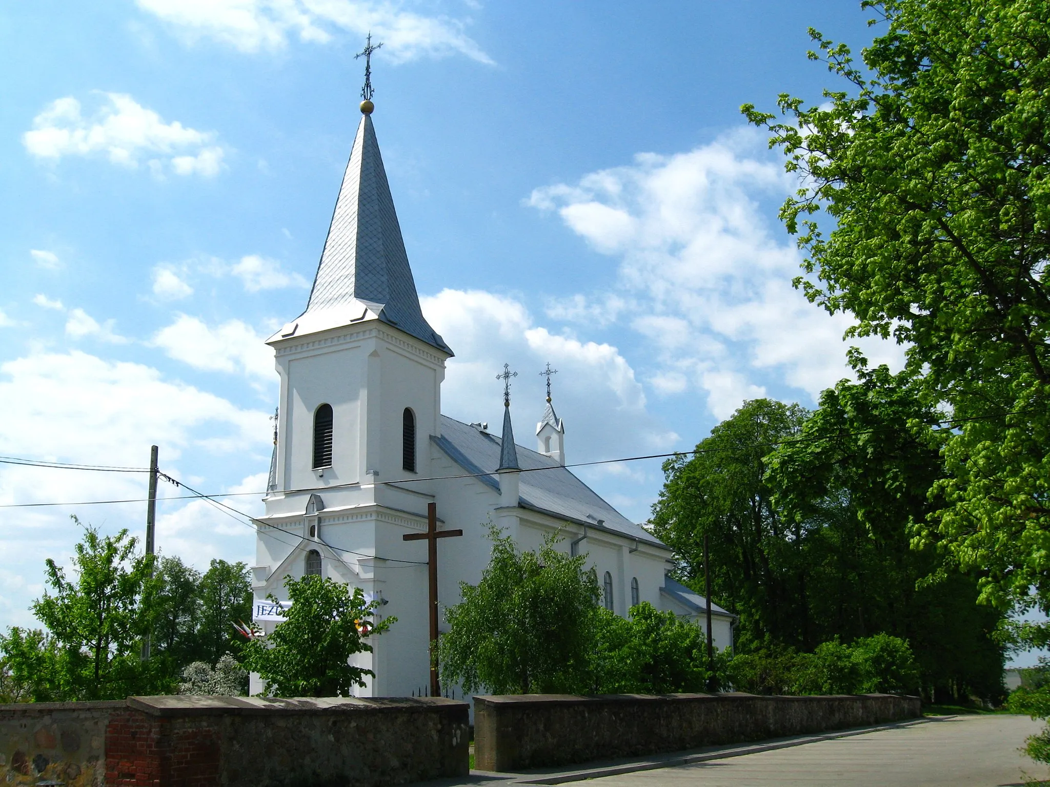 Photo showing: Roman–catholic parish church of Transfiguration of Jesus — brick, neo-baroque church built in years 1880-1883 by project of Romuald Lenczewski, destroyed in World War II. in 1944 rebuilt. Until 1961 — parish church, in years 1961-1983 branch church, then again parish