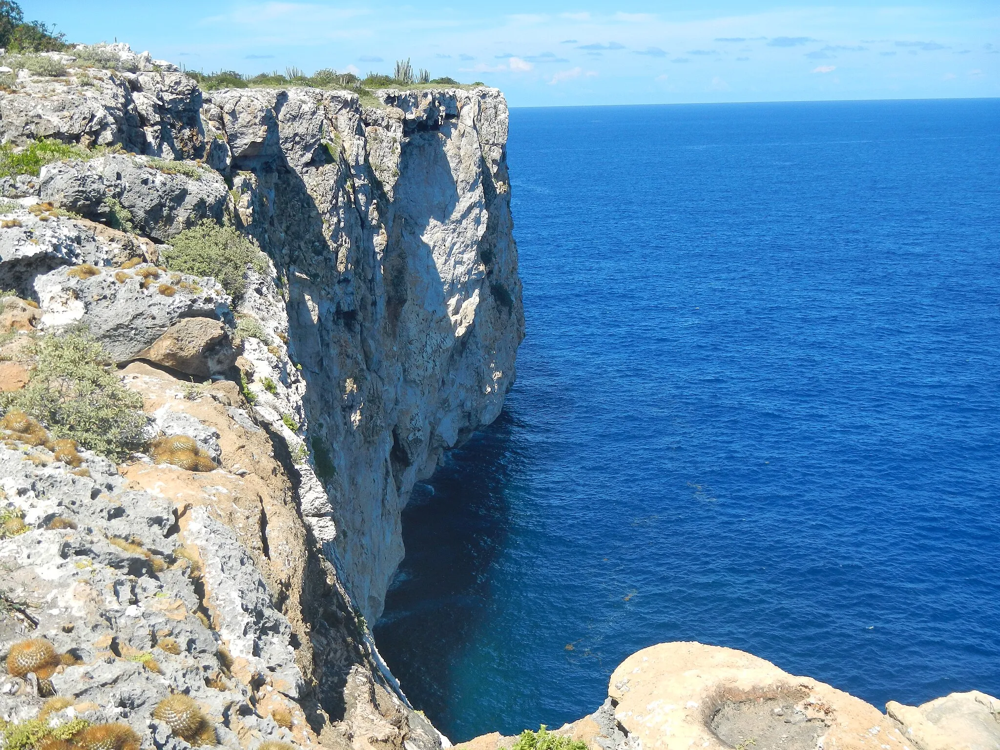 Photo showing: When one of the hikers looked down he almost went into shock. Look at this blue; the blue of the very deep waters of the Puerto Rico Trench, the deepest spot in the Atlantic.