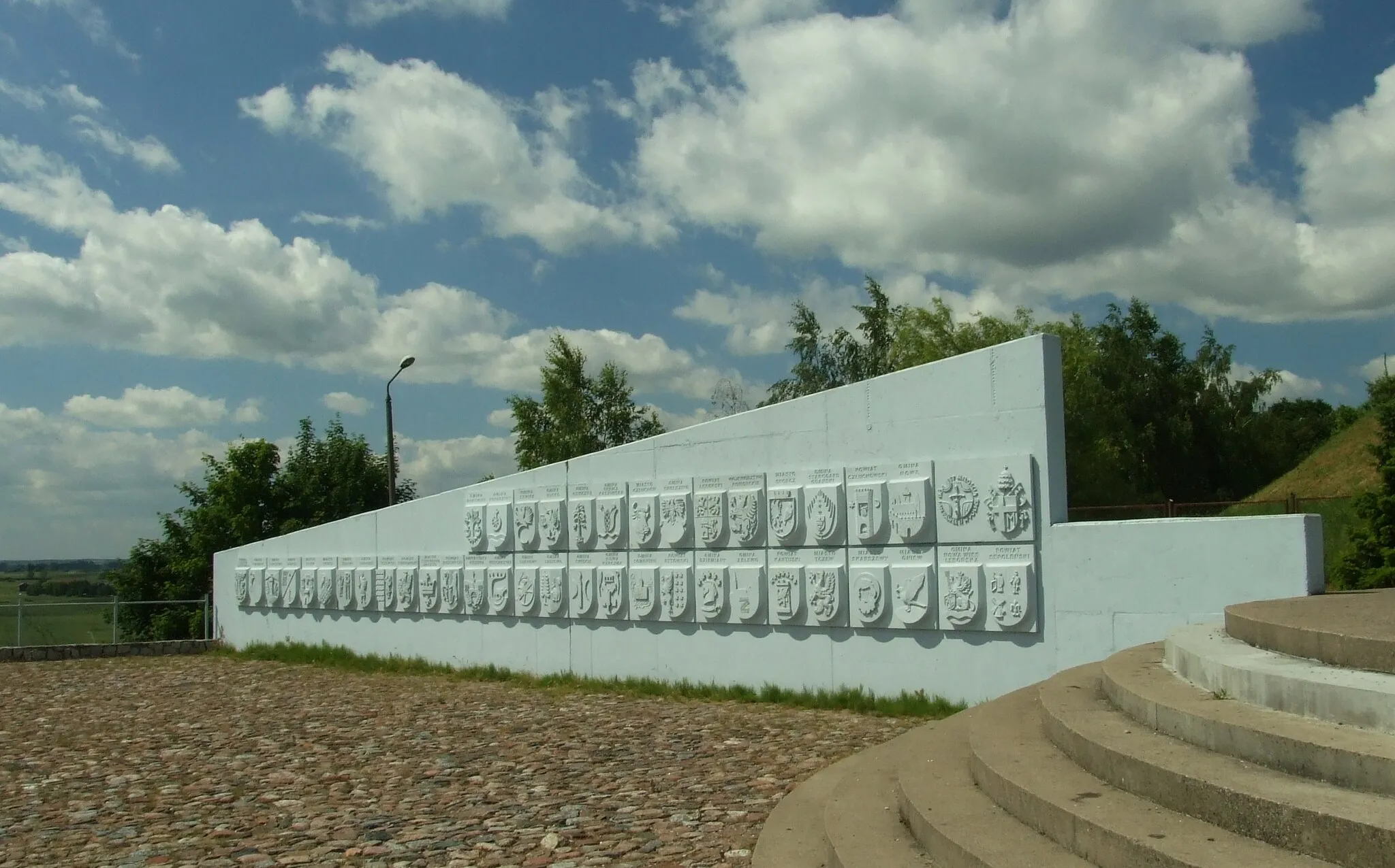 Photo showing: Coat of arms of various gminas in the vicinity of Pelpin at the John Paul II. memorial - a hill close to the town of Pelplin. Pomeranian voivodeship, Poland