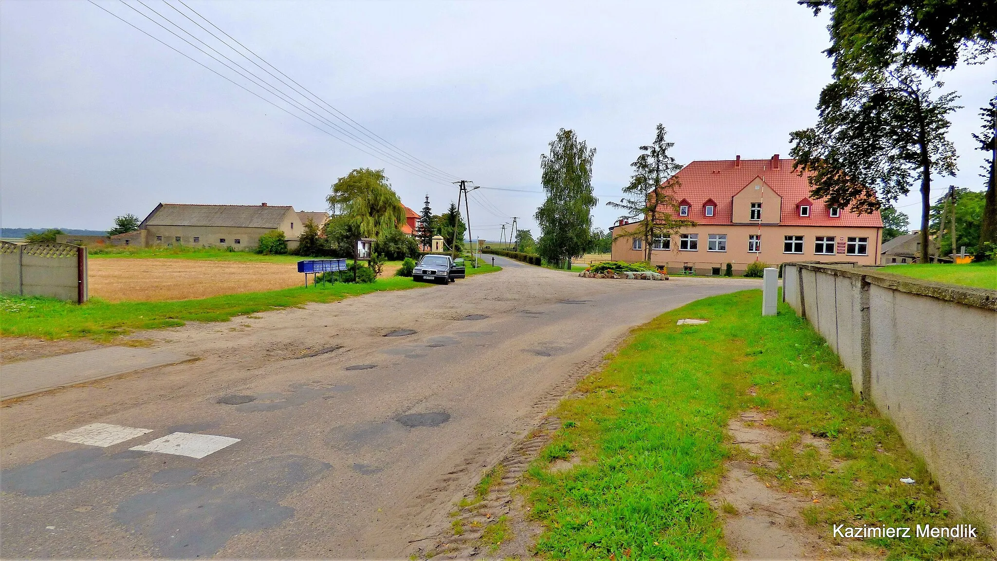 Photo showing: Panigródz widok zabudowań miejscowości z okolicy kościoła.