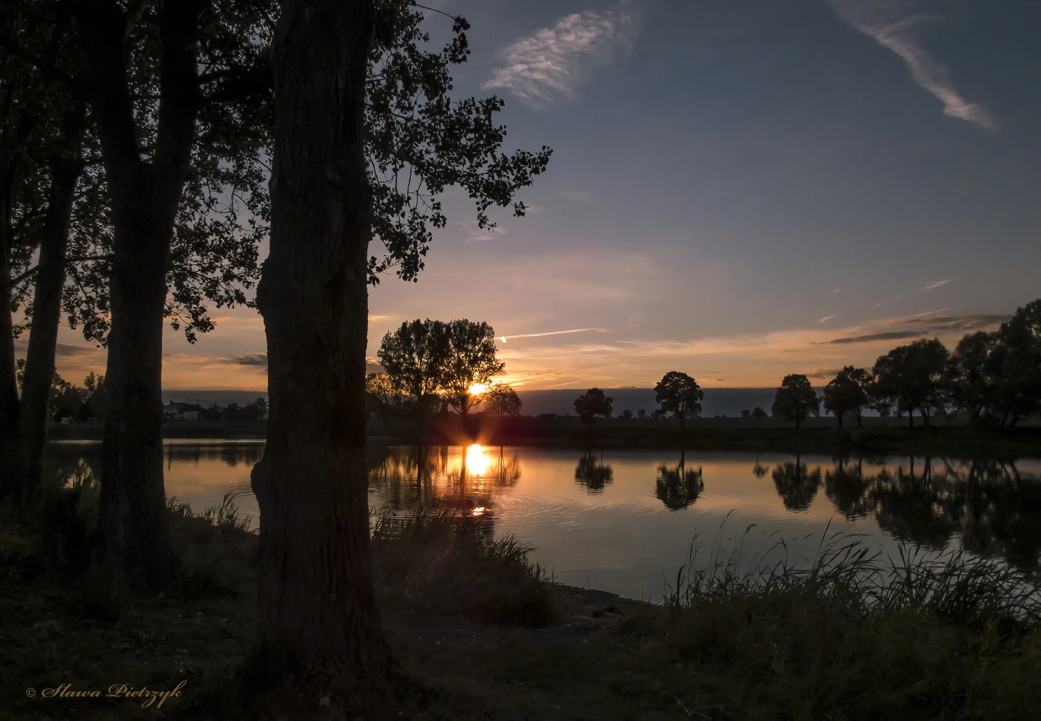 Photo showing: 500px provided description: Autumn Evening 2 [#trees ,#sky ,#landscape ,#lake ,#beauty ,#sunset ,#water ,#blue ,#sun ,#clouds ,#summer ,#beautiful]