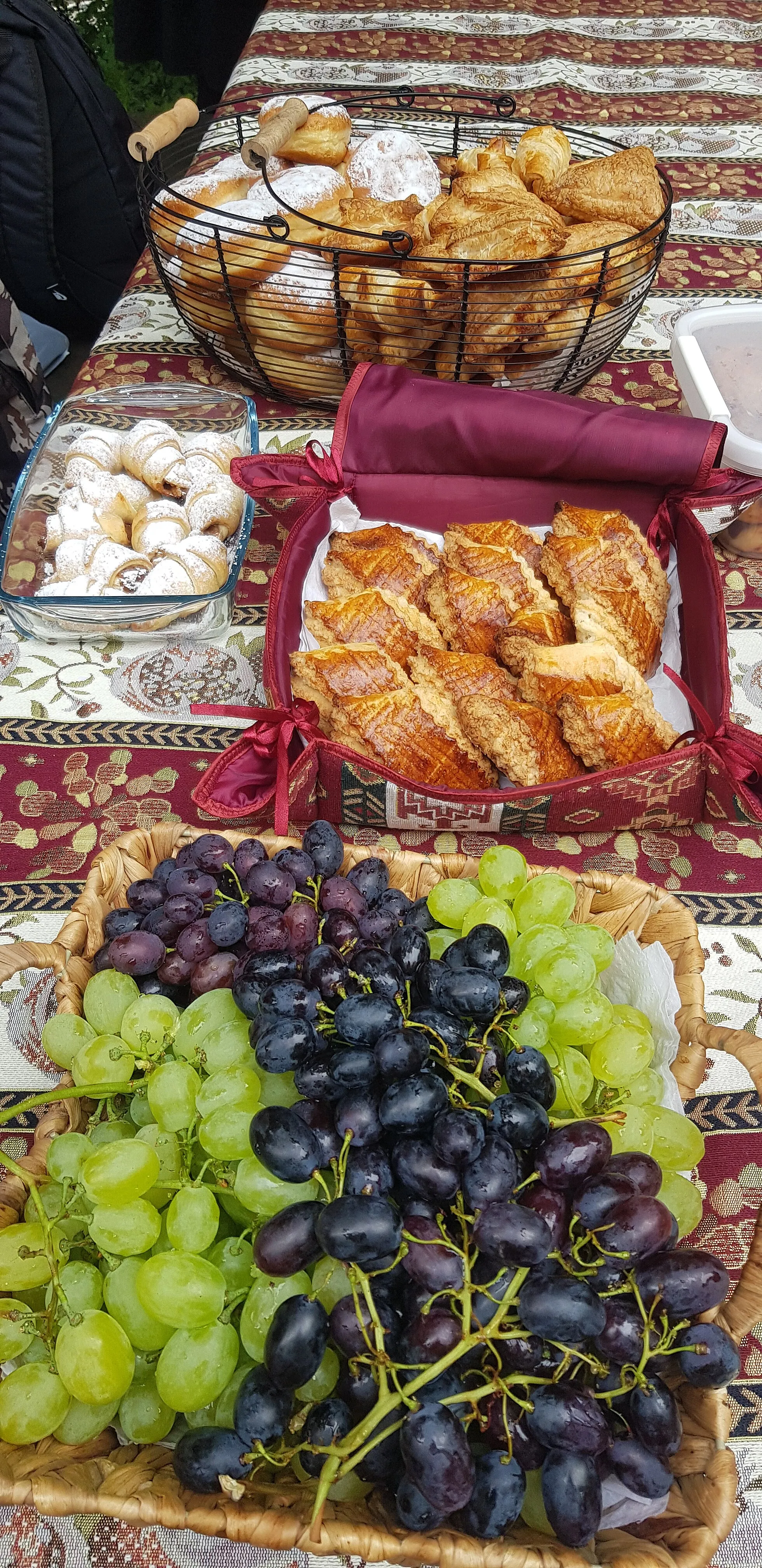Photo showing: Armenian Gata in slices,  grapes and more delicious cookies