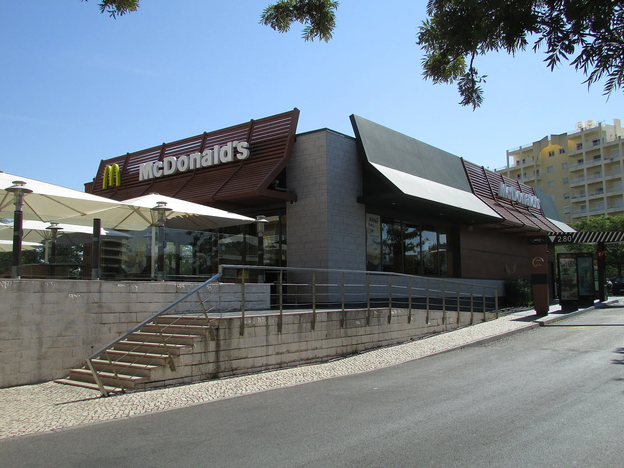 Photo showing: The McDonalds drive-through which is located on Avenida da Marina within the resort of Vilamoura, Algarve. Portugal.