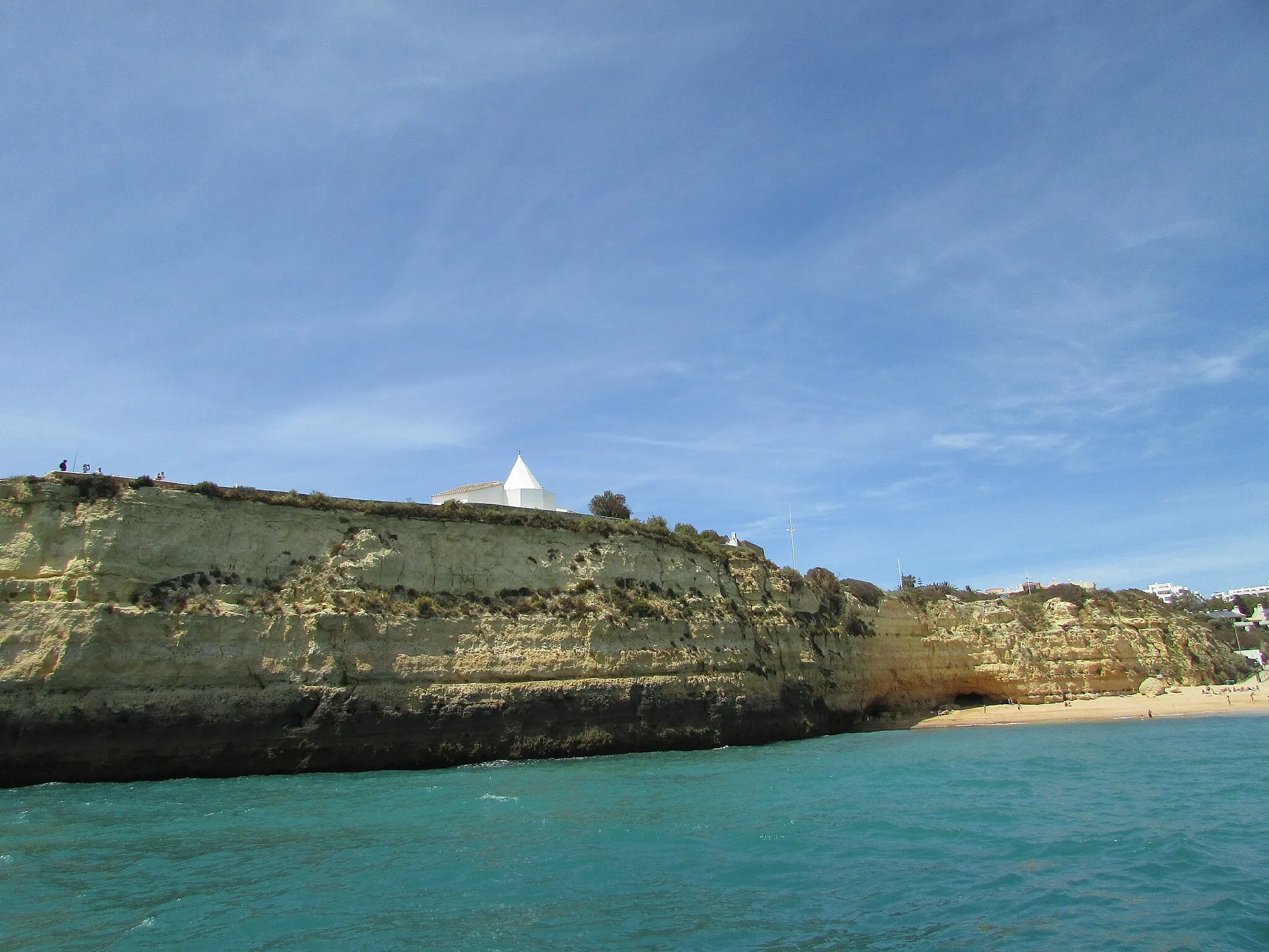 Photo showing: Aboard the "Dreamwave" boat trip looking at the Igreja de Nossa Senhora da Rocha perched on the cliff top near Porches, Algarve, Portugal.