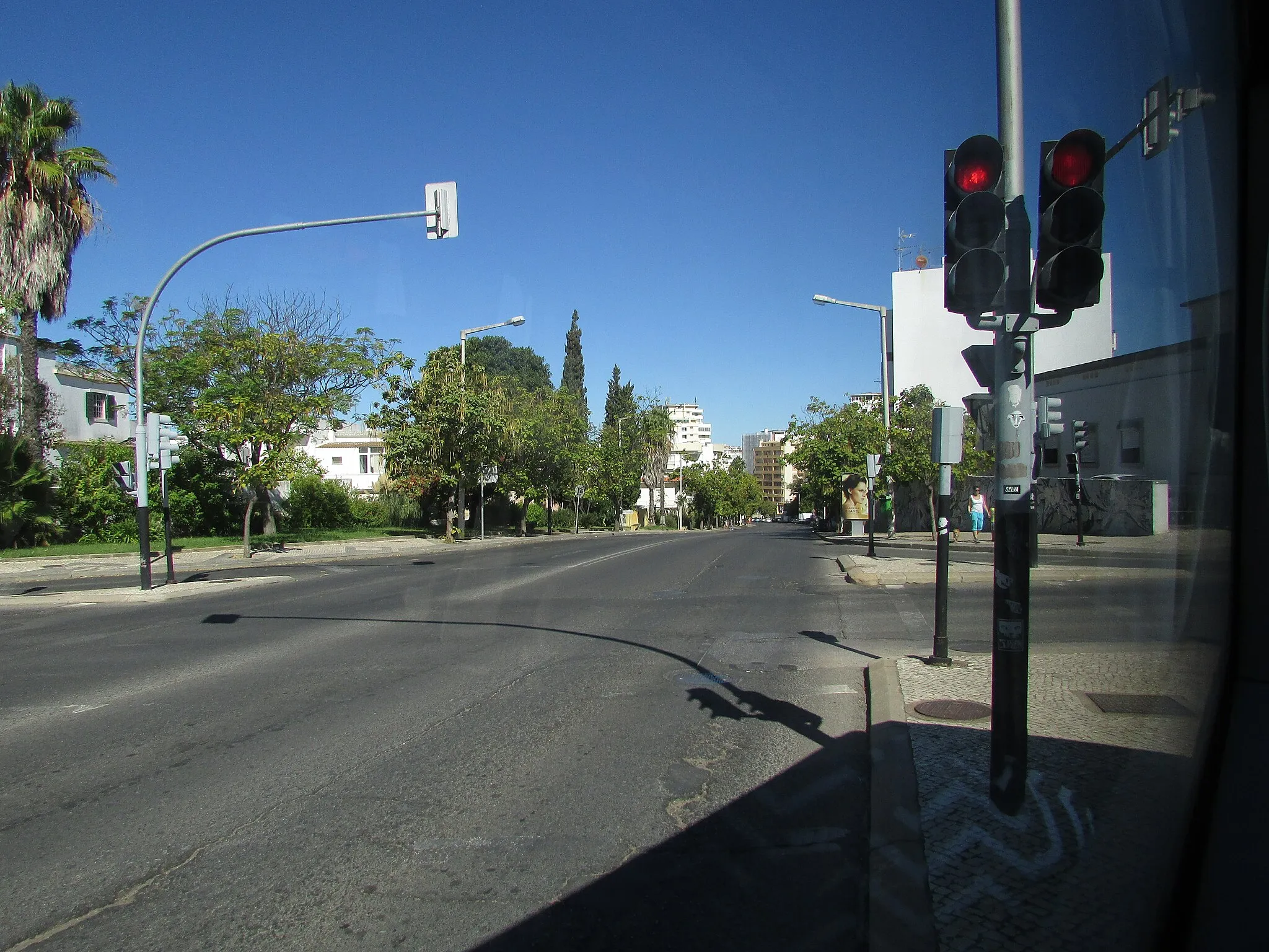 Photo showing: Looking north west along Avenida Dr. Julio F. de Almeida Carrapato in the city of Faro, Algarve, Portugal.