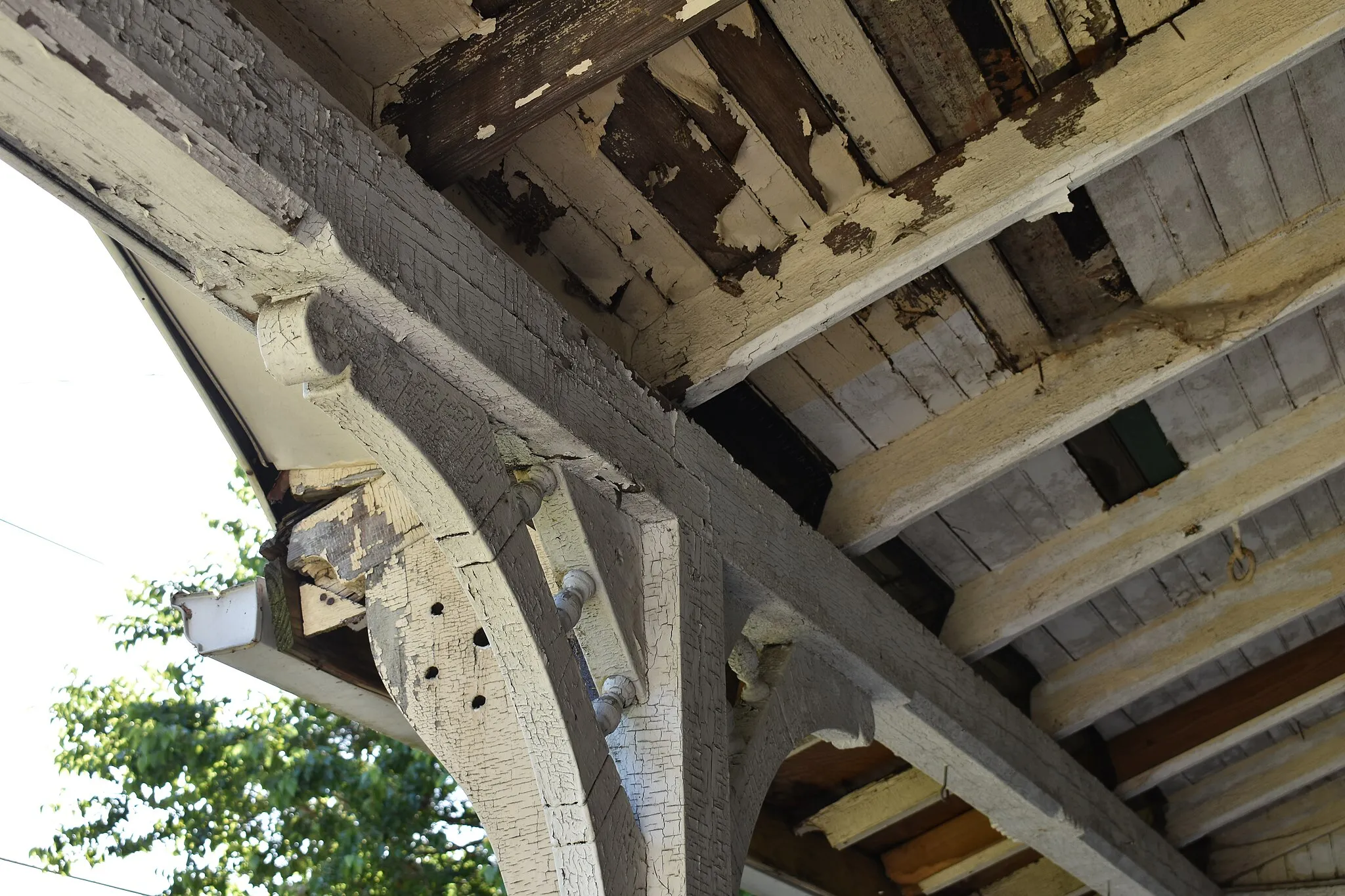 Photo showing: Lead paint applied to a porch, cracking and flaking off. Lead paint is a major source of environmental lead contamination.