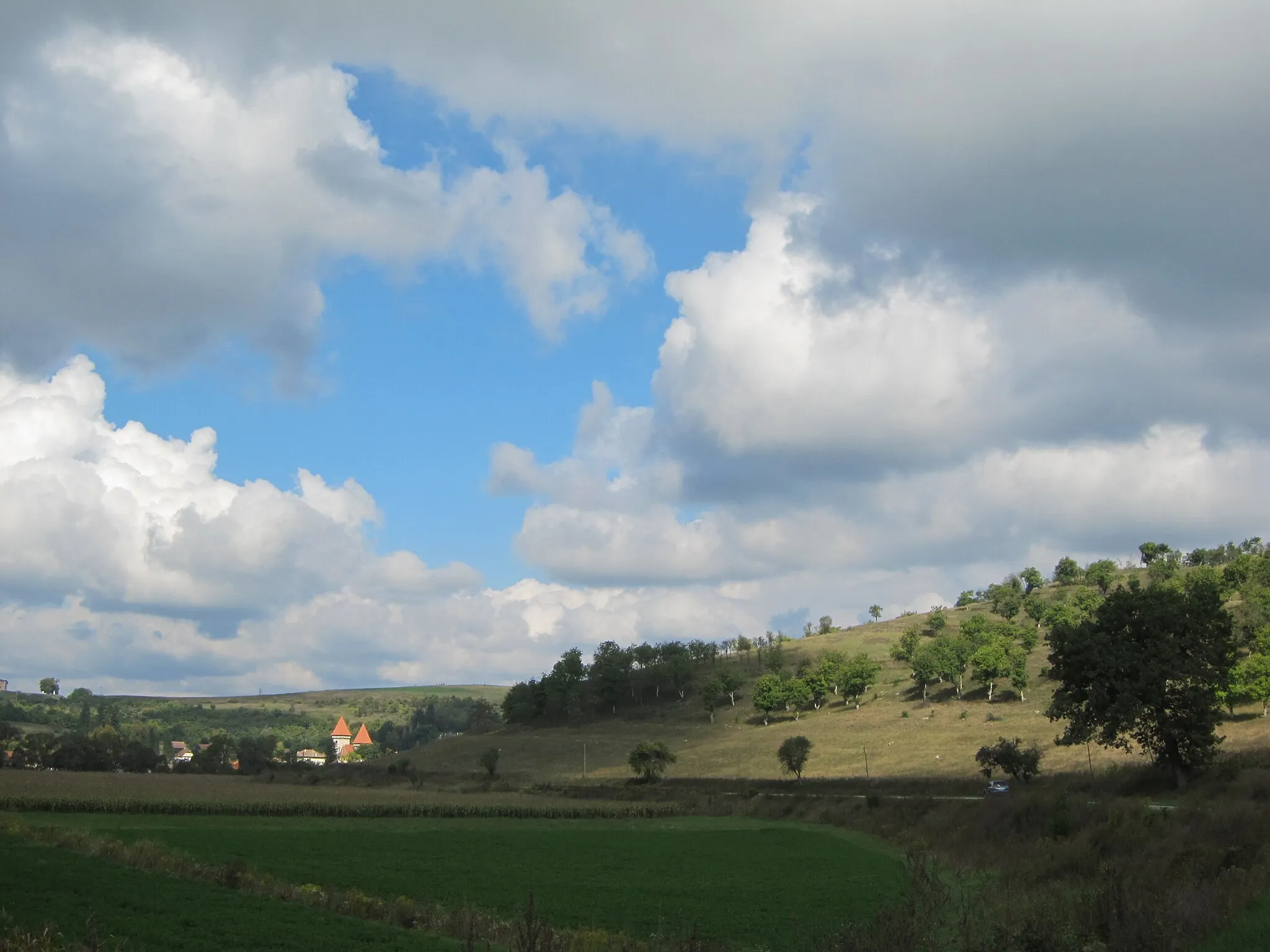 Photo showing: Curves and Dramatic Clouds in Dealu Frumos
