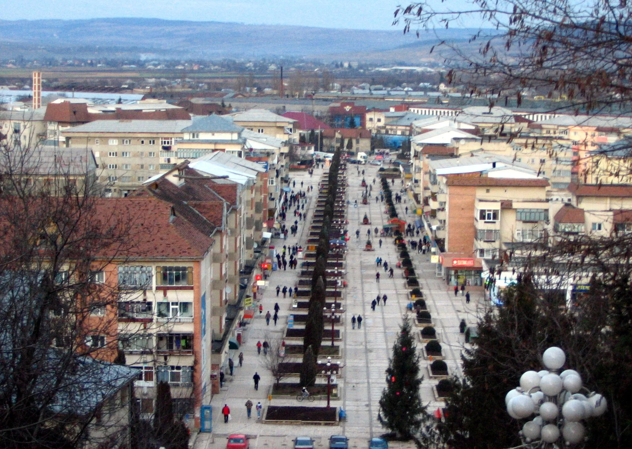 Photo showing: Paşcani, Romania The lower part of the town so-called "the Valley" seen from the stairway that links the uphill area to the valley