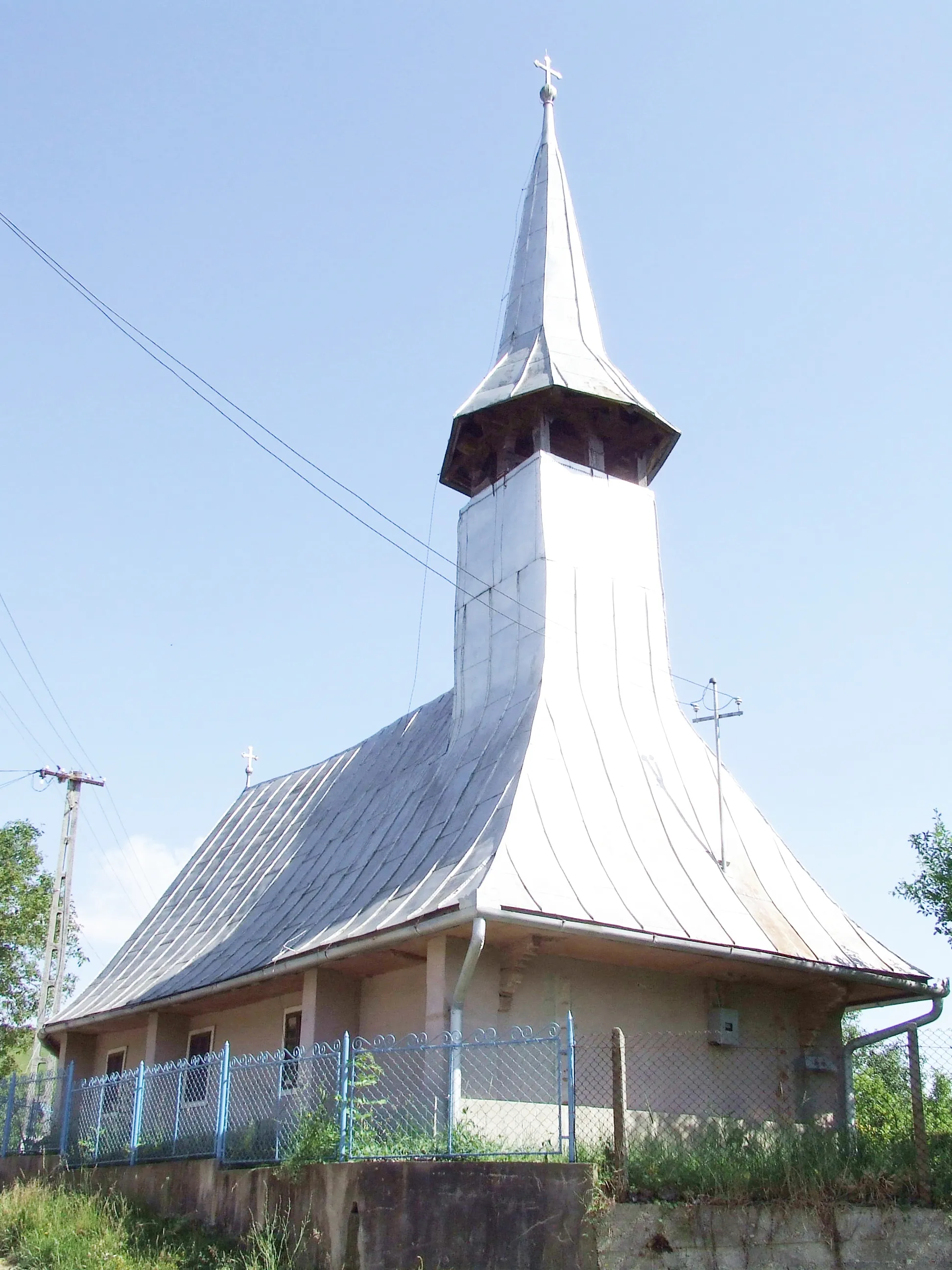 Photo showing: Biserica de lemn din Husia, judeţul Sălaj.
Autor: Bogdan Ilieş

Data: iunie 2007