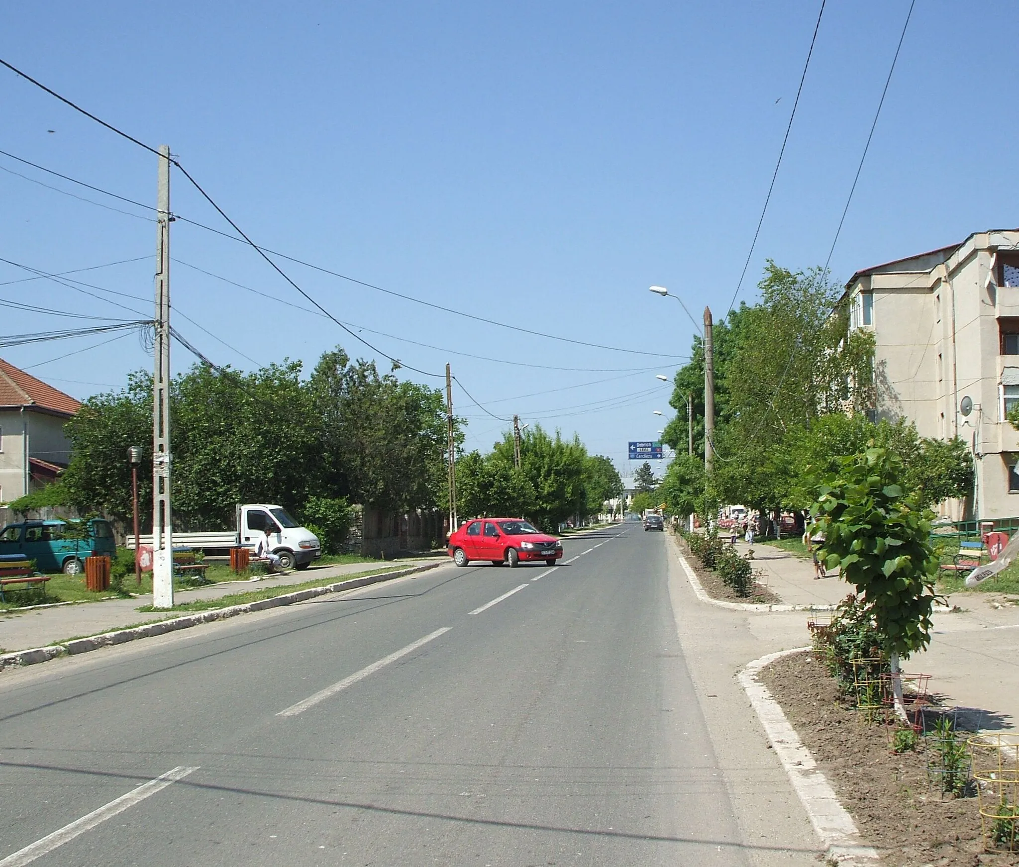 Photo showing: Negru Vodă town center. The local highschool is at the end of the main road in the picture.