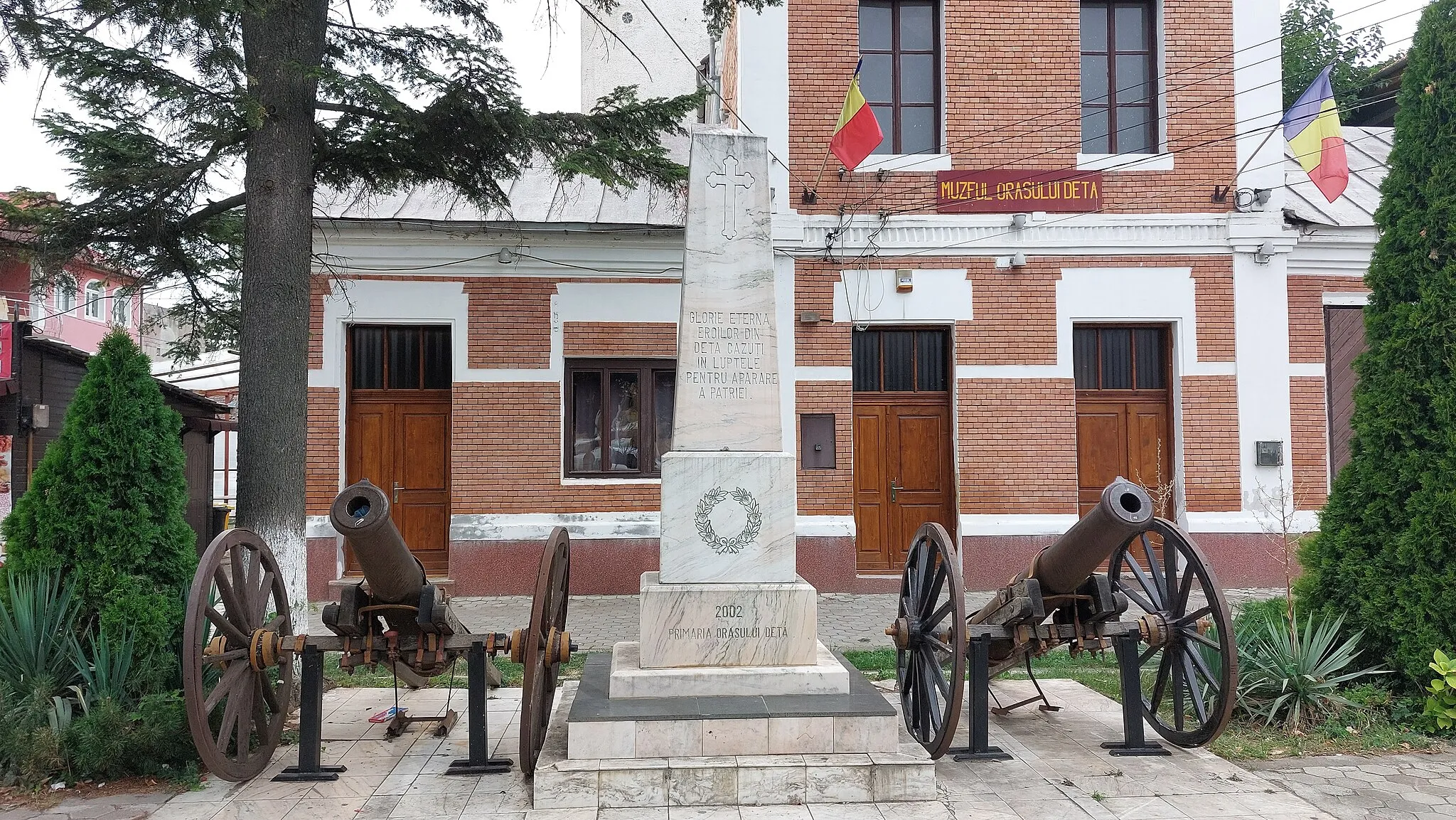 Photo showing: With memorial in front