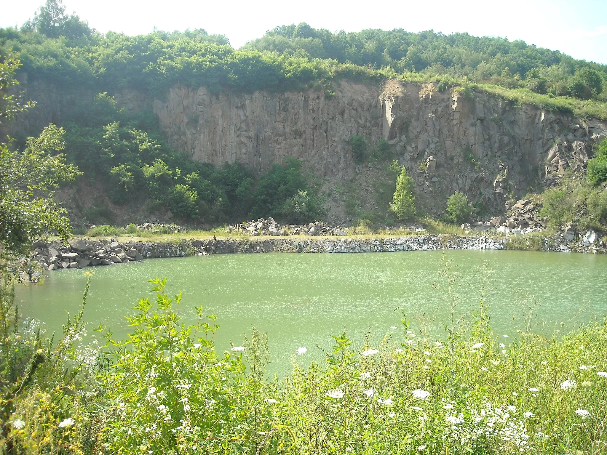Photo showing: quarry and pond, SE of Aciuța village, Romania