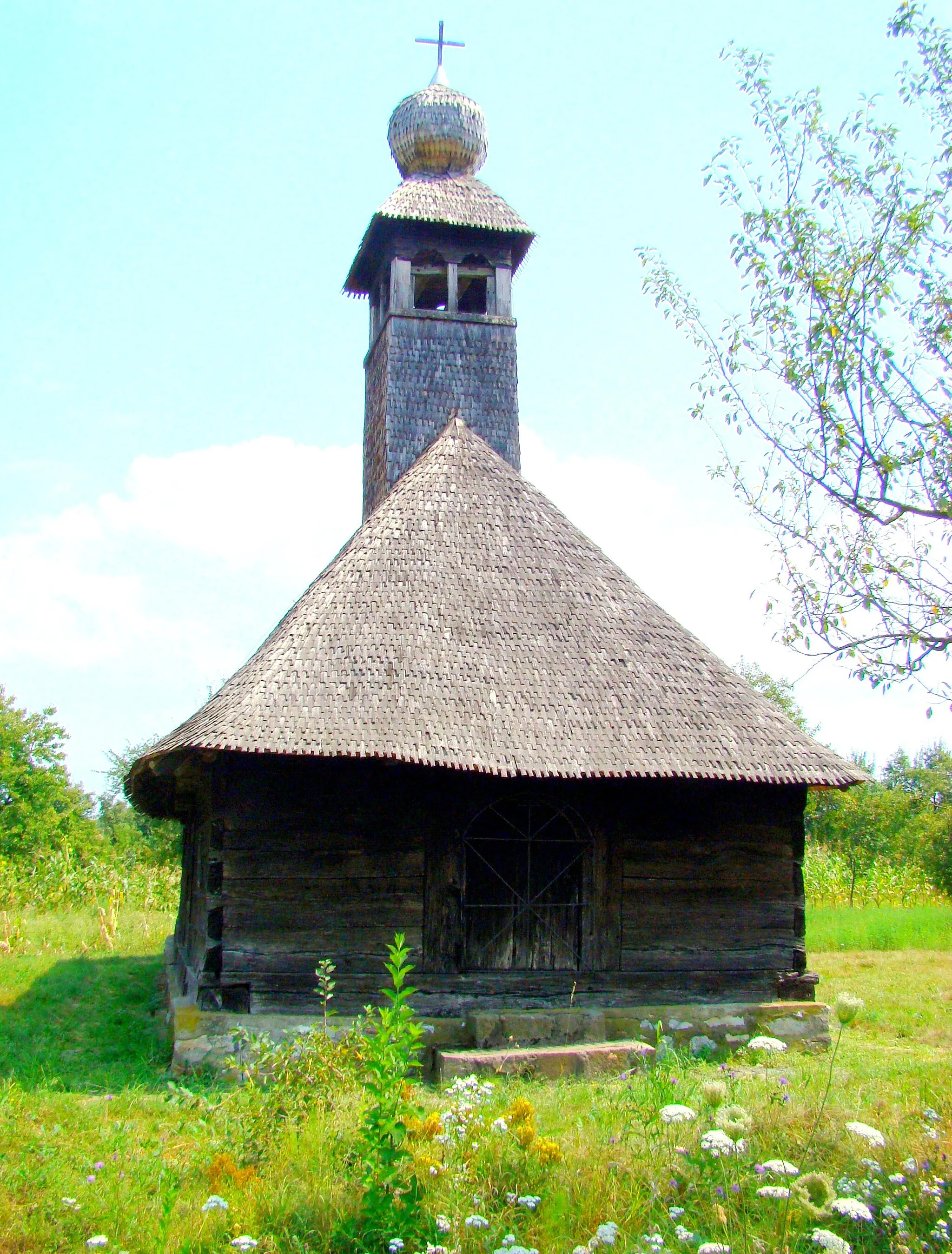 Photo showing: Biserica de lemn „Cuvioasa Paraschiva”, sat aparținător Bătești; oraș Făget	144	sec. XVIII