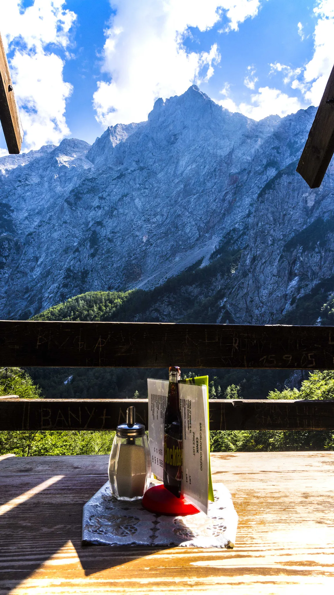 Photo showing: bar orlovo gnezdo, 500px provided description: Hangin' up there. The weather's pretty nice. [#sky ,#landscape ,#mountains ,#nature ,#travel ,#clouds ,#vacation ,#tourism ,#summer ,#green ,#food ,#sunny ,#relax ,#alps]
