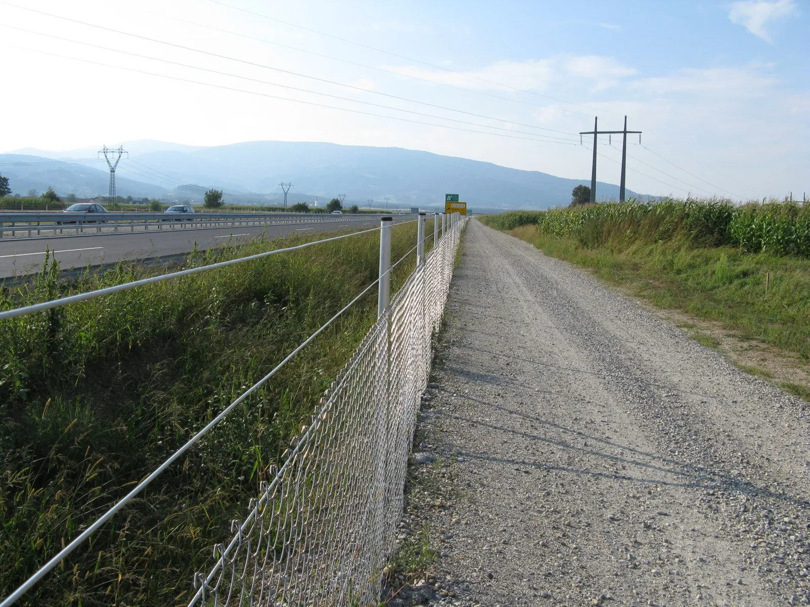 Photo showing: Macadam road by A4 highway, Slovenia