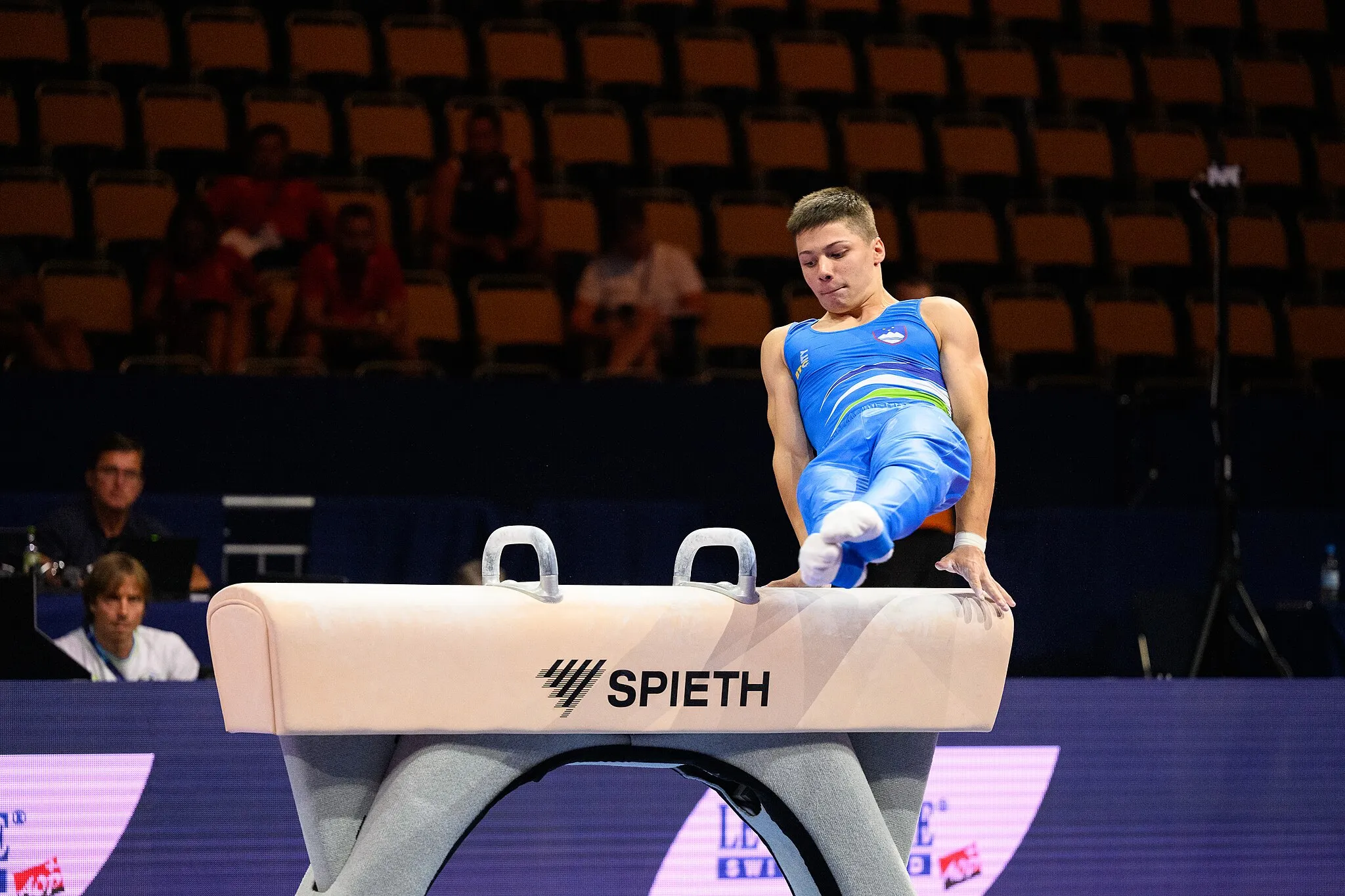 Photo showing: Impressions from Pommel Horse at Podium Training
2022 European Championships in Men's Artistic Gymnastics (Juniors)
Depicted: Anze Hribar

Photo taken in Olympic Hall Munich on 2022-08-17 18:13:34 18:13:34