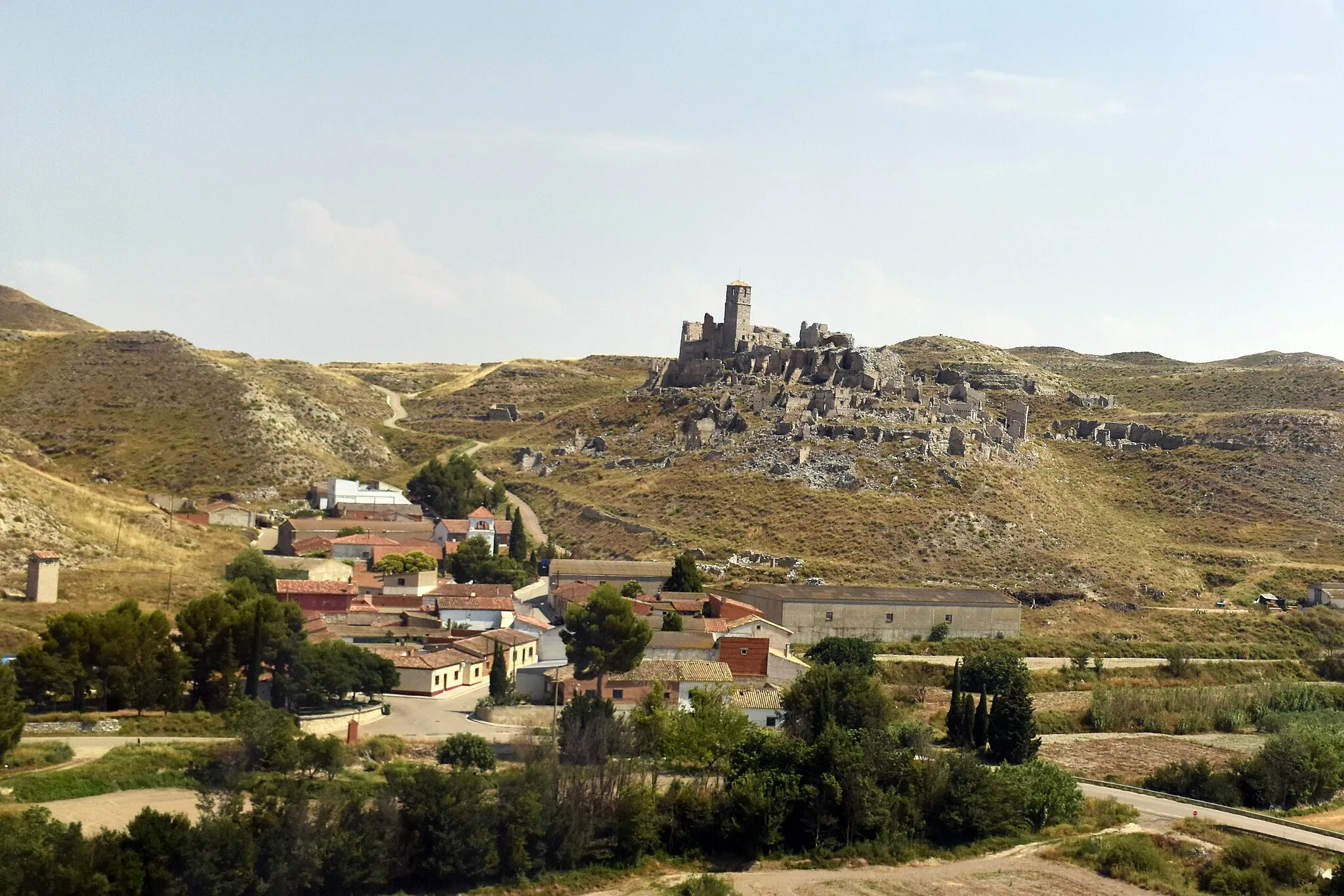 Photo showing: View of new village of Rodén in the front of ruins of old one preserved as memorial of Spanish Civil War.