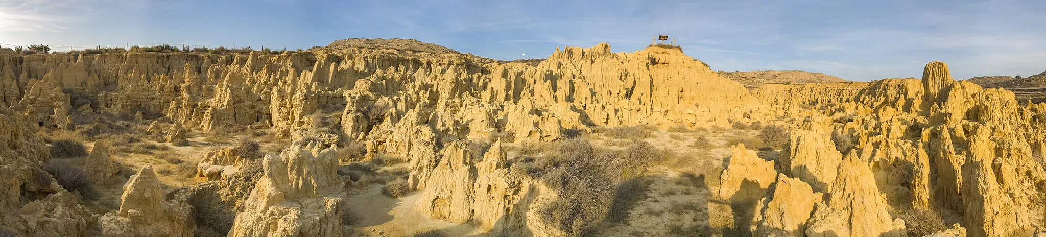 Photo showing: Panorama view of Los Aguarales de Valpalmas, a rare, fragile and dynamic geological phenomena located near Valpalmas, Zaragoza, Spain. The landscape is the result of water flows over fragile material in a process known as piping.