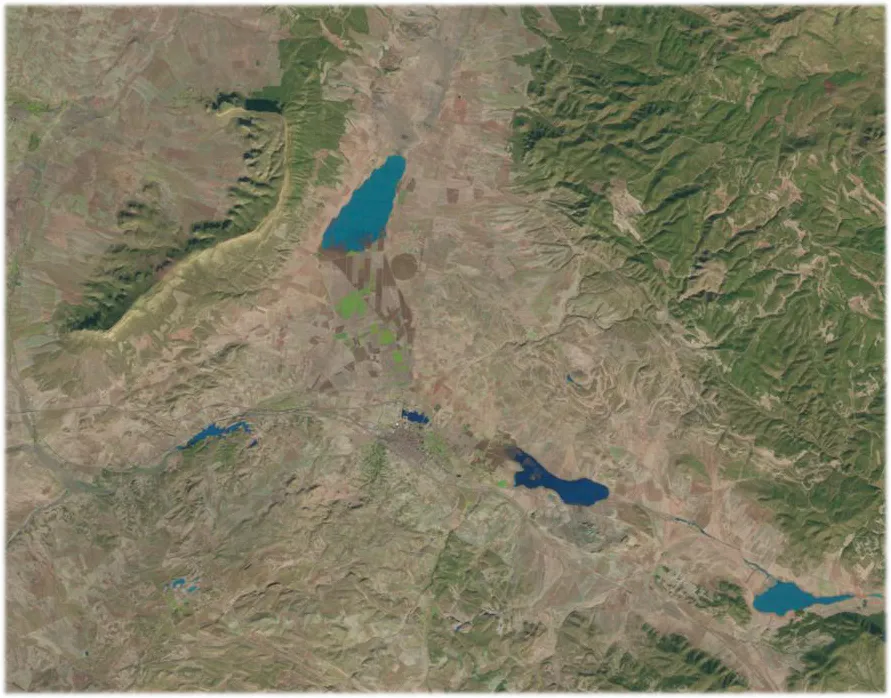 Photo showing: Vista desde Landsat 5 de la laguna de San Benito (centro izquierda) y otras zonas inundadas durante las extraordinarias lluvias, observándose el embalse de Almansa lleno, la zona del instituto de Almansa inundada y los llanos hacia el este encharcados.