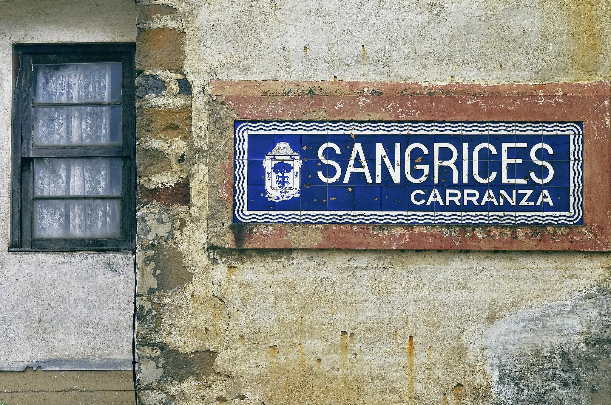 Photo showing: Place name sign. Sangrices, Karrantza Arana,  Biscay,  Basque Country, Spain