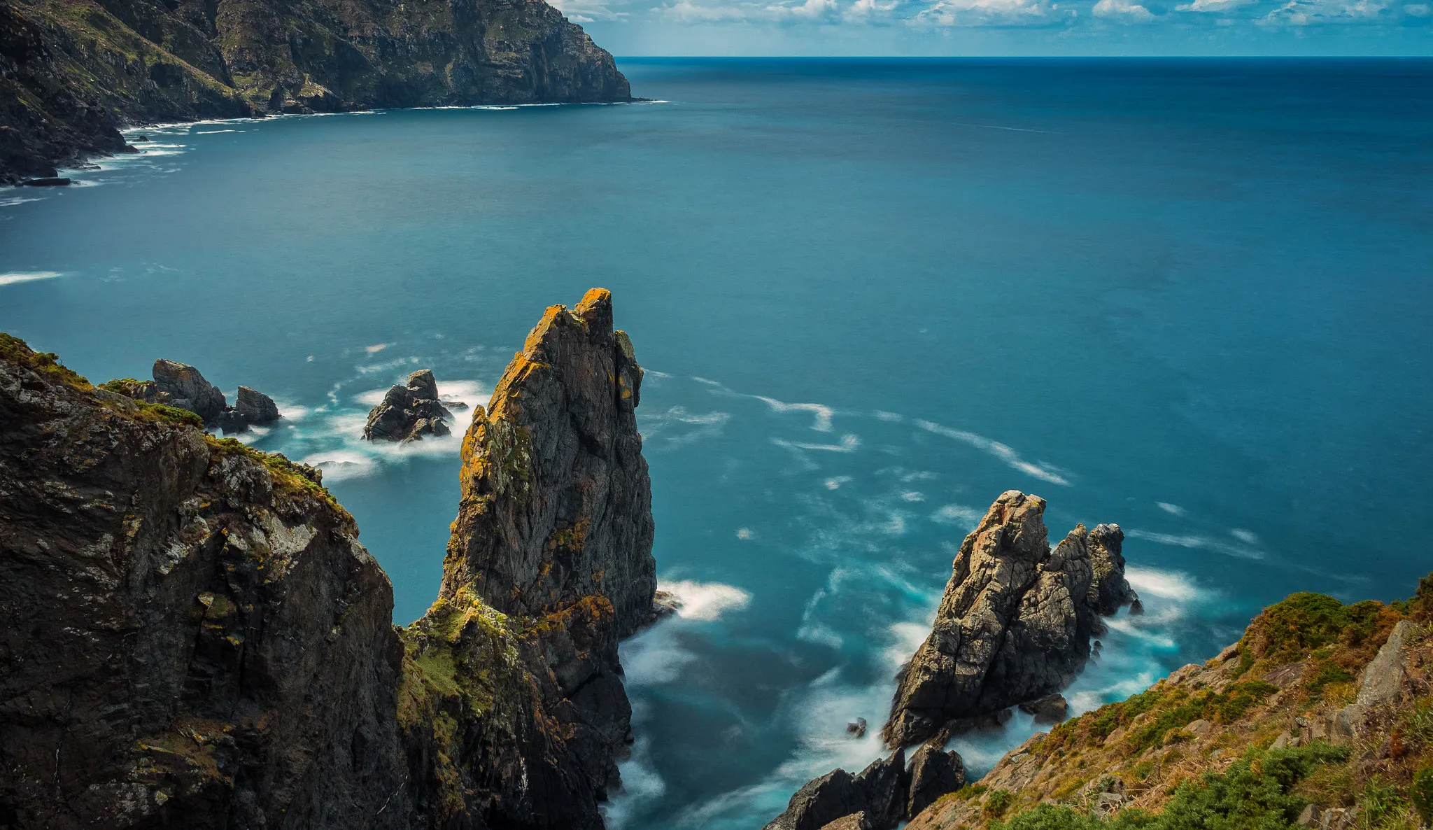 Photo showing: 500px provided description: Cape Ortegal [#blue ,#clouds ,#coastline ,#rocks ,#seascape ,#spain ,#cliff ,#galicia ,#cantabric sea ,#rocky coastline ,#north spain]