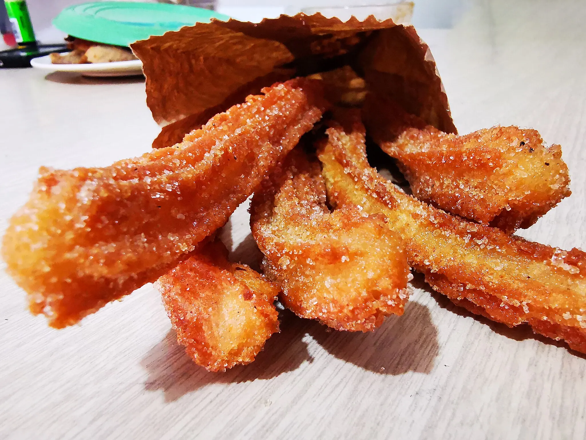 Photo showing: deliciosos churros azucarados