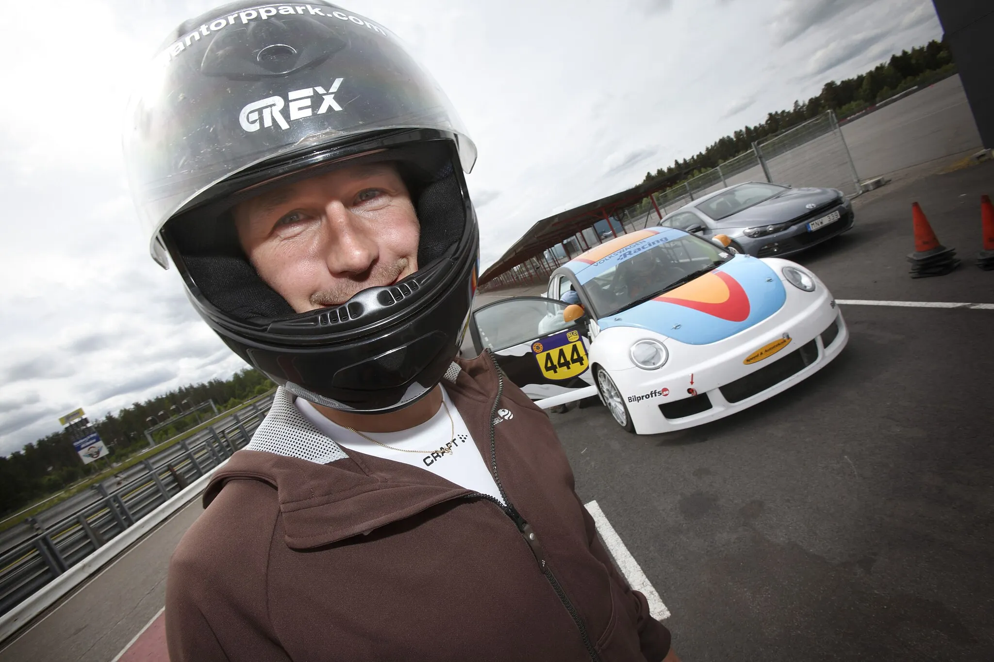 Photo showing: Swedish cross-country skiier Anders Södergren testing Volkswagen race cars at Mantorp Park, Sweden.