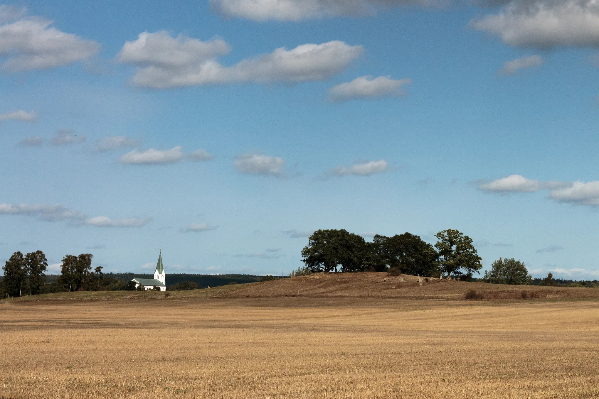 Photo showing: The church and the old cemetary of Näsum, Sweden.