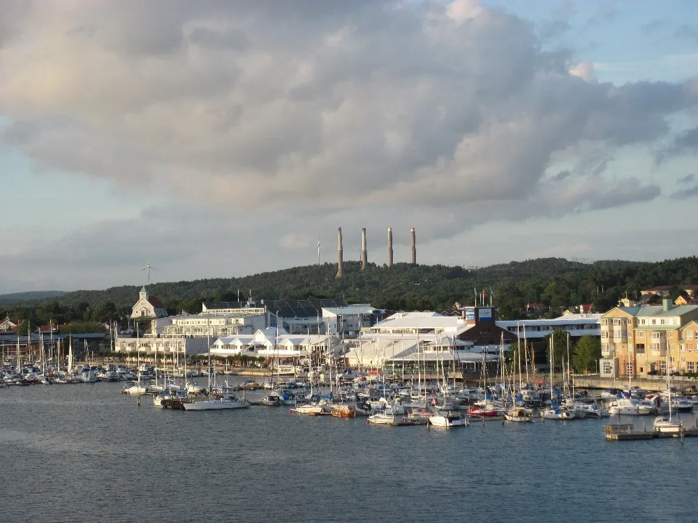 Photo showing: Stenungsund and the power plants four giant chimneys in the background